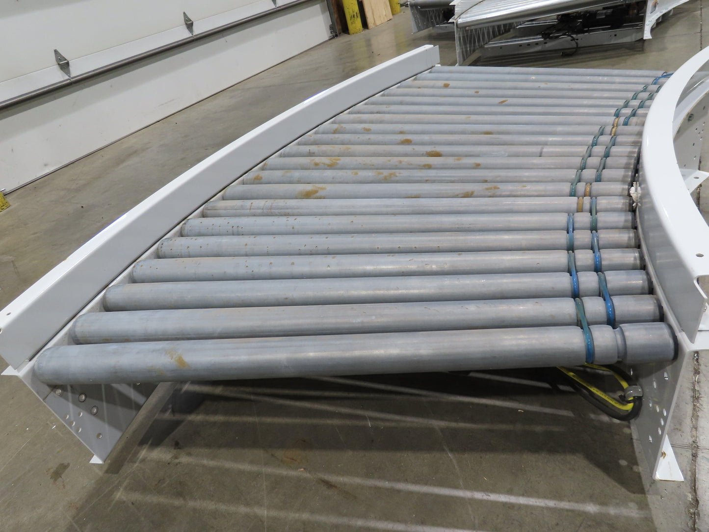 Roach 36"BF x 45° Curve Powered Roller Conveyor 130VDC O-Ring Belt Drive