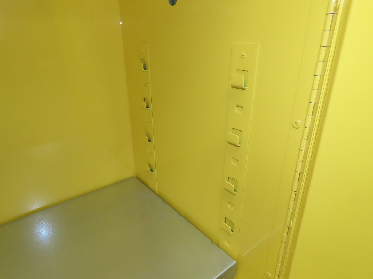 Uline H-1563M-Y Yellow Flammable Safety Cabinet Dual Door 30 Gallon Liquid