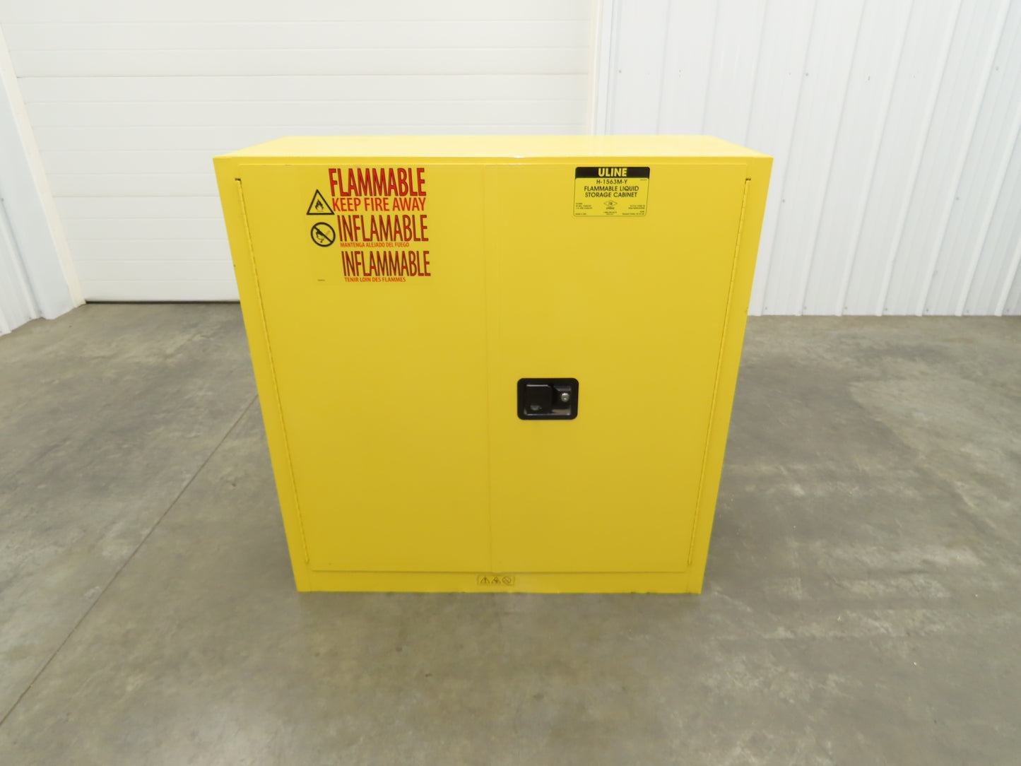 Uline H-1563M-Y Yellow Flammable Safety Cabinet Dual Door 30 Gallon Liquid