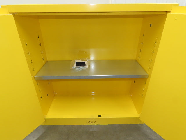 Uline H-1563M-Y Yellow Flammable Safety Cabinet Dual Door 30 Gallon Liquid