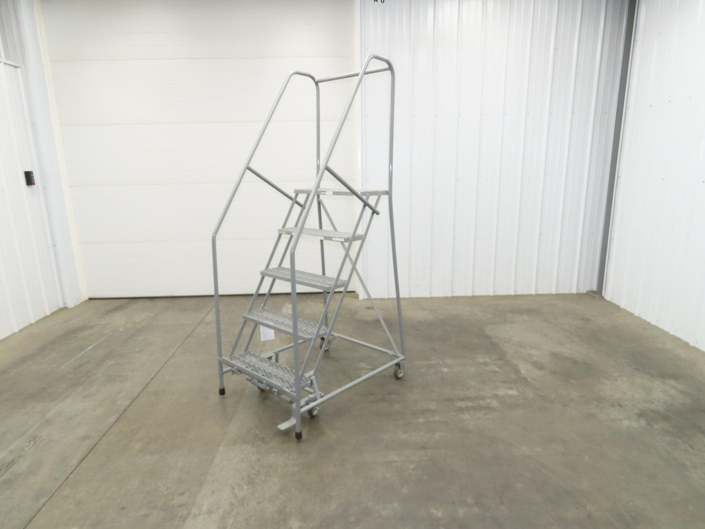 Uline H-84-110 Rolling Ladder 5 Step 10" Work Platform 50" Top Step 450lbs