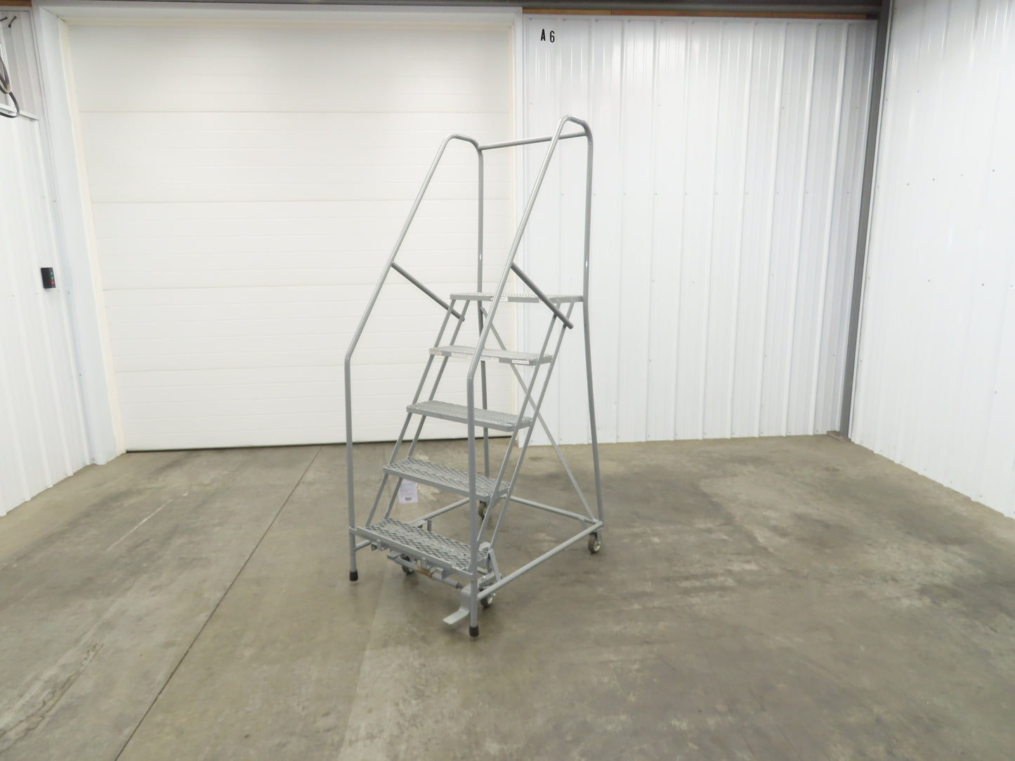 Uline H-84-110 Rolling Ladder 5 Step 10" Work Platform 50" Top Step 450lbs