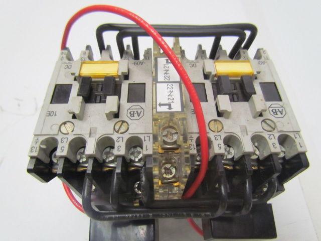 Allen Bradley 104-AO9NZ243 Ser A Reversing Contactor 600V 9A w/24VDC Coil