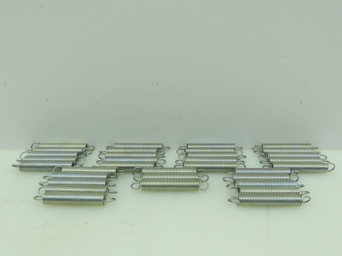 Lee Spring LE-049D-09-M 2.5 to 4.3" Music Wire Spring 13LB Zinc Plated Lot of 33