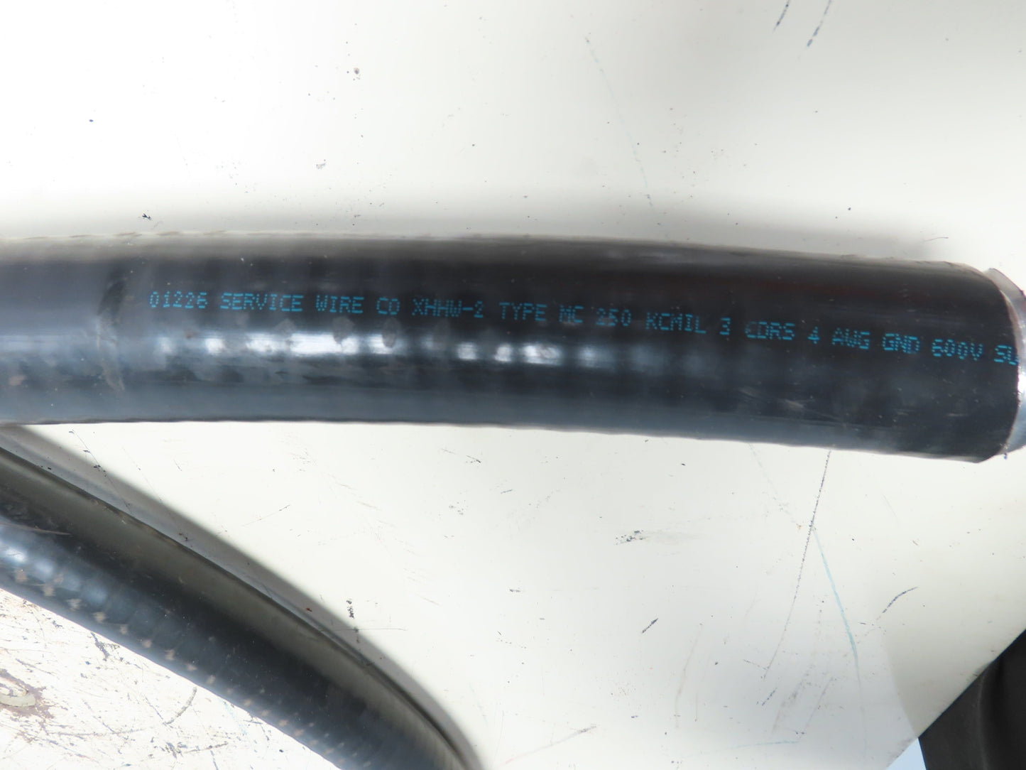 Service Wire Co  XHHW-2 Type MC 250 KCMIL 3 CDRS 4 AWG GND 600V LSZH Jacket 9.5'