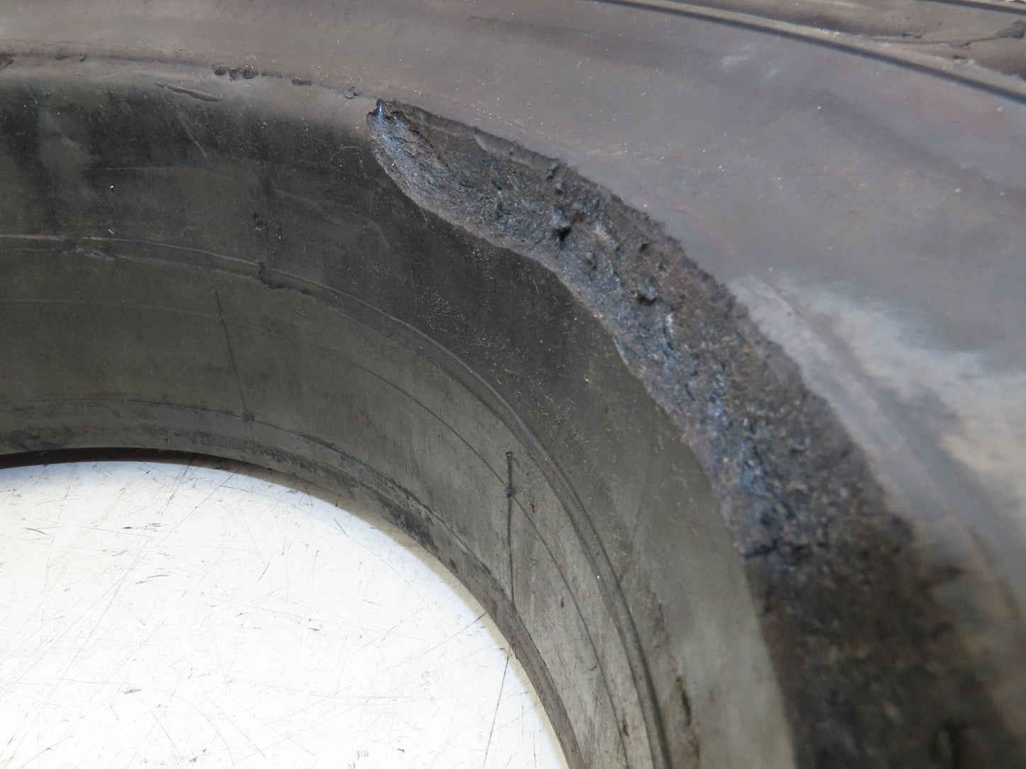 Rhino 7.00-12/5.00 Forklift Tire Resilient Solid Traction Black 25x7x12