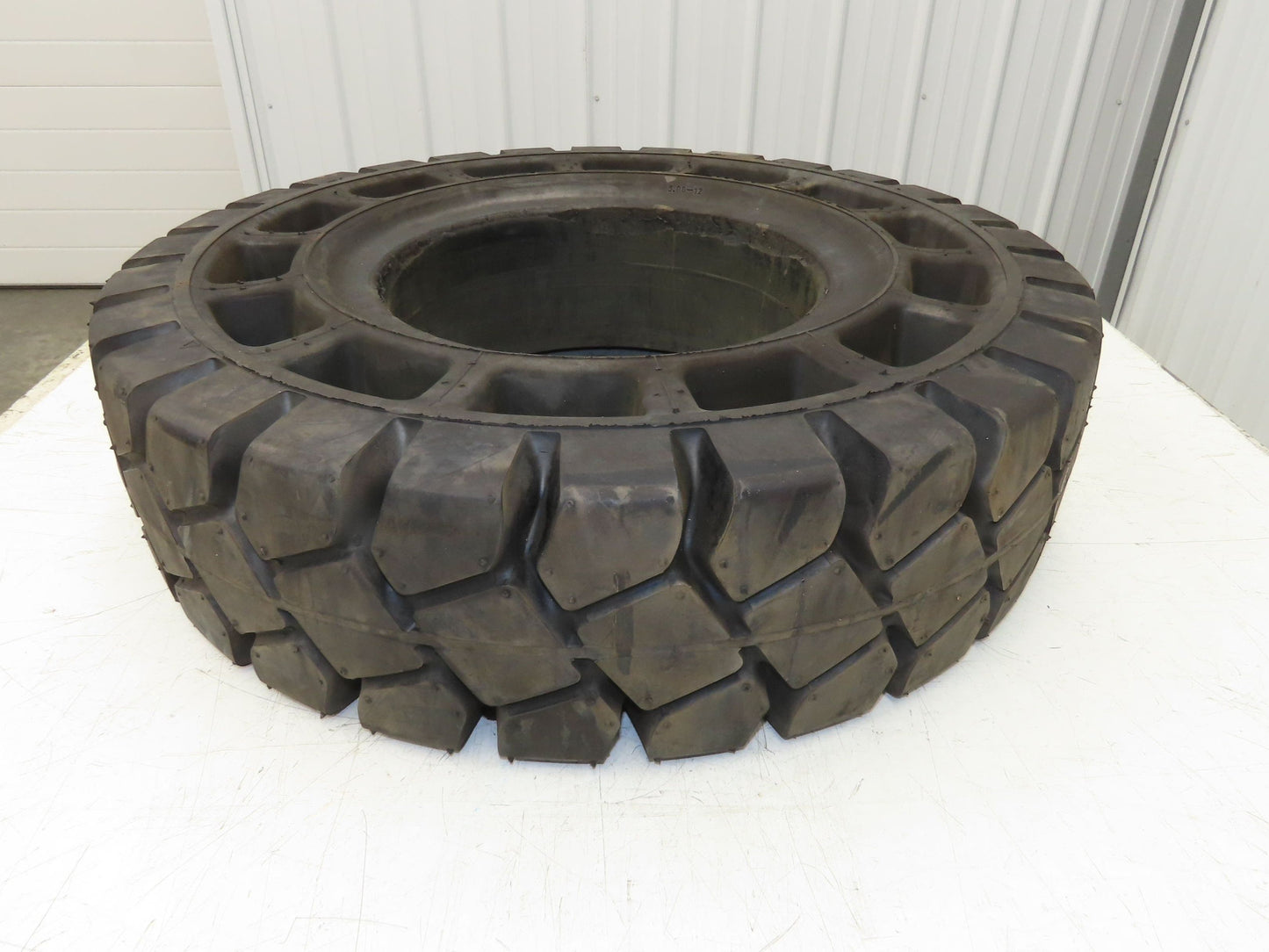 Rhino 7.00-12/5.00 Forklift Tire Resilient Solid Traction Black 25x7x12