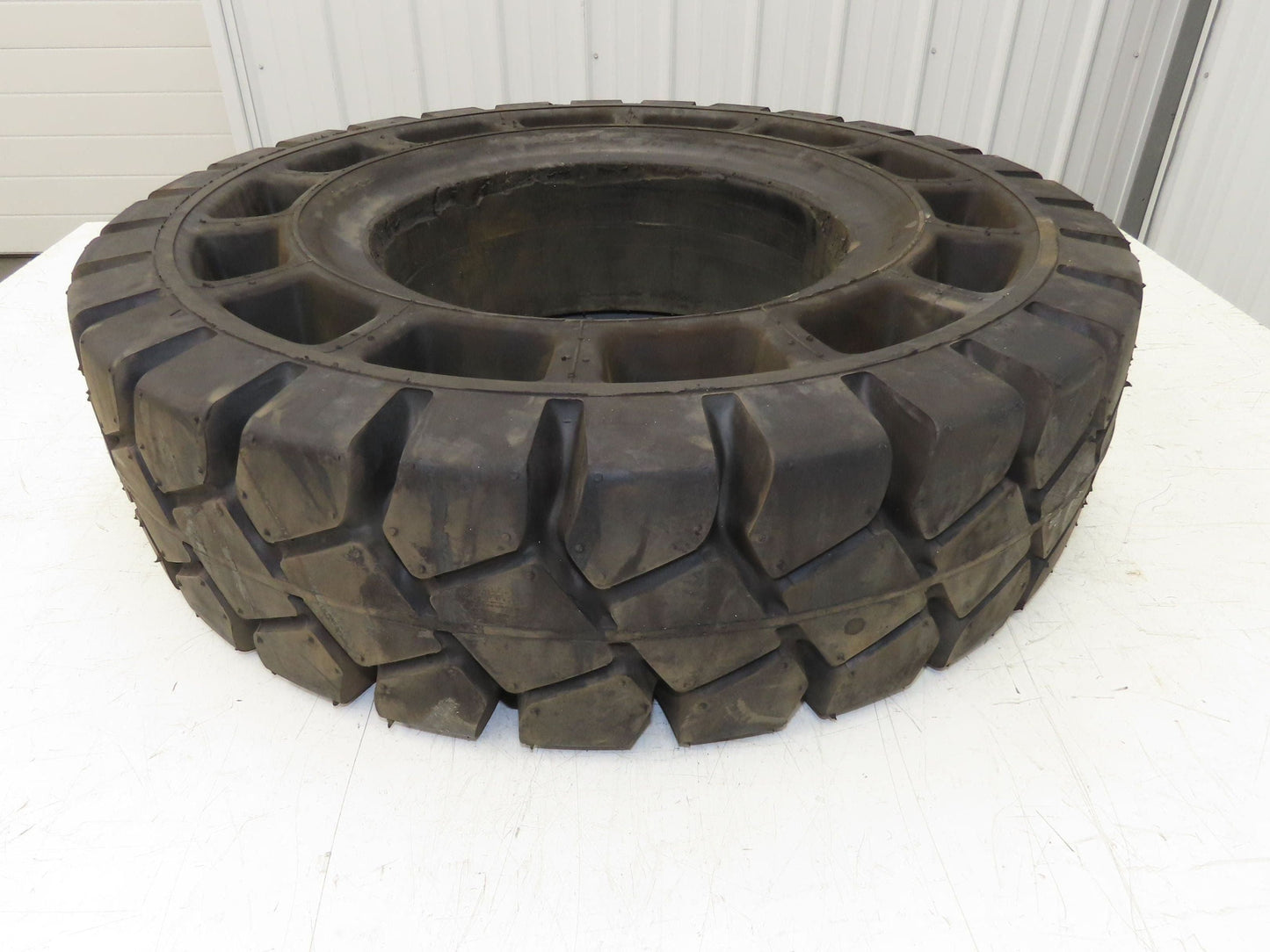 Rhino 7.00-12/5.00 Forklift Tire Resilient Solid Traction Black 25x7x12