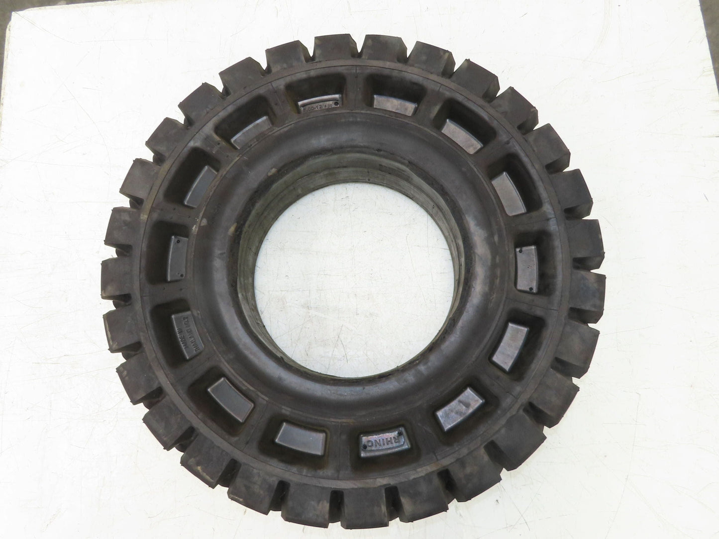 Rhino 7.00-12/5.00 Forklift Tire Resilient Solid Traction Black 25x7x12