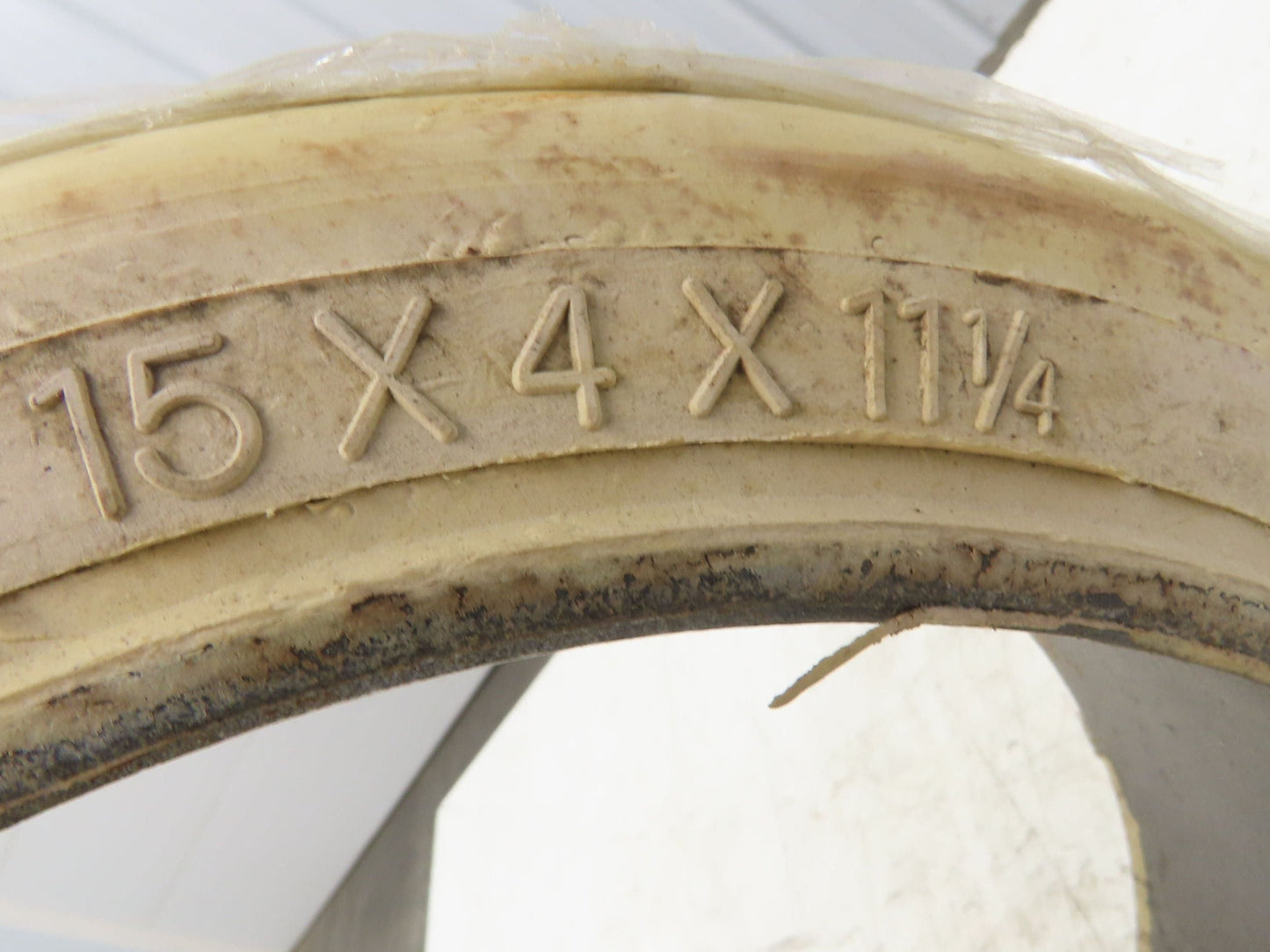 Super Solid 15x4x11-1/4 Forklift Tire Smooth Solid Press-on White Non-Marking