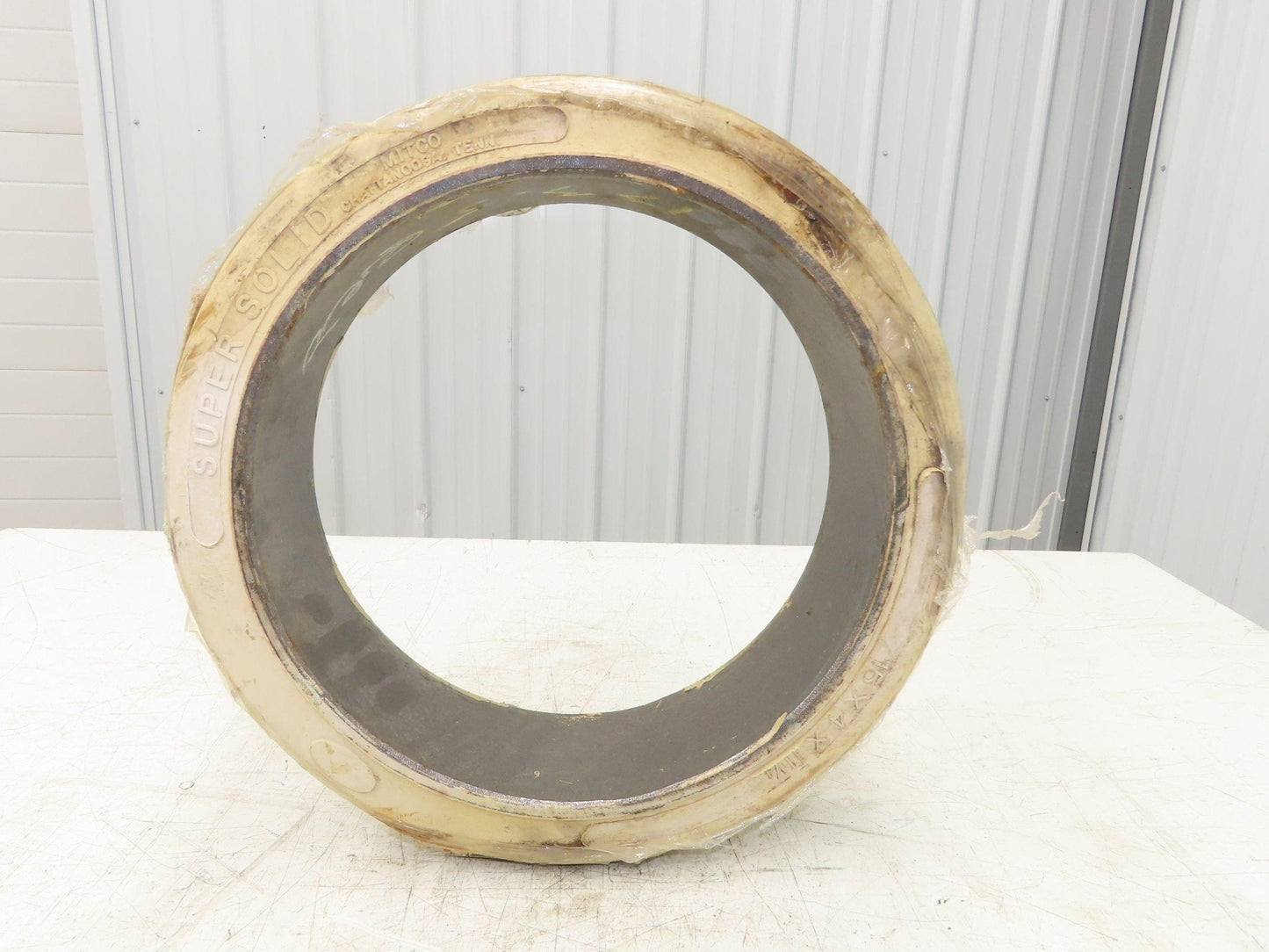 Super Solid 15x4x11-1/4 Forklift Tire Smooth Solid Press-on White Non-Marking