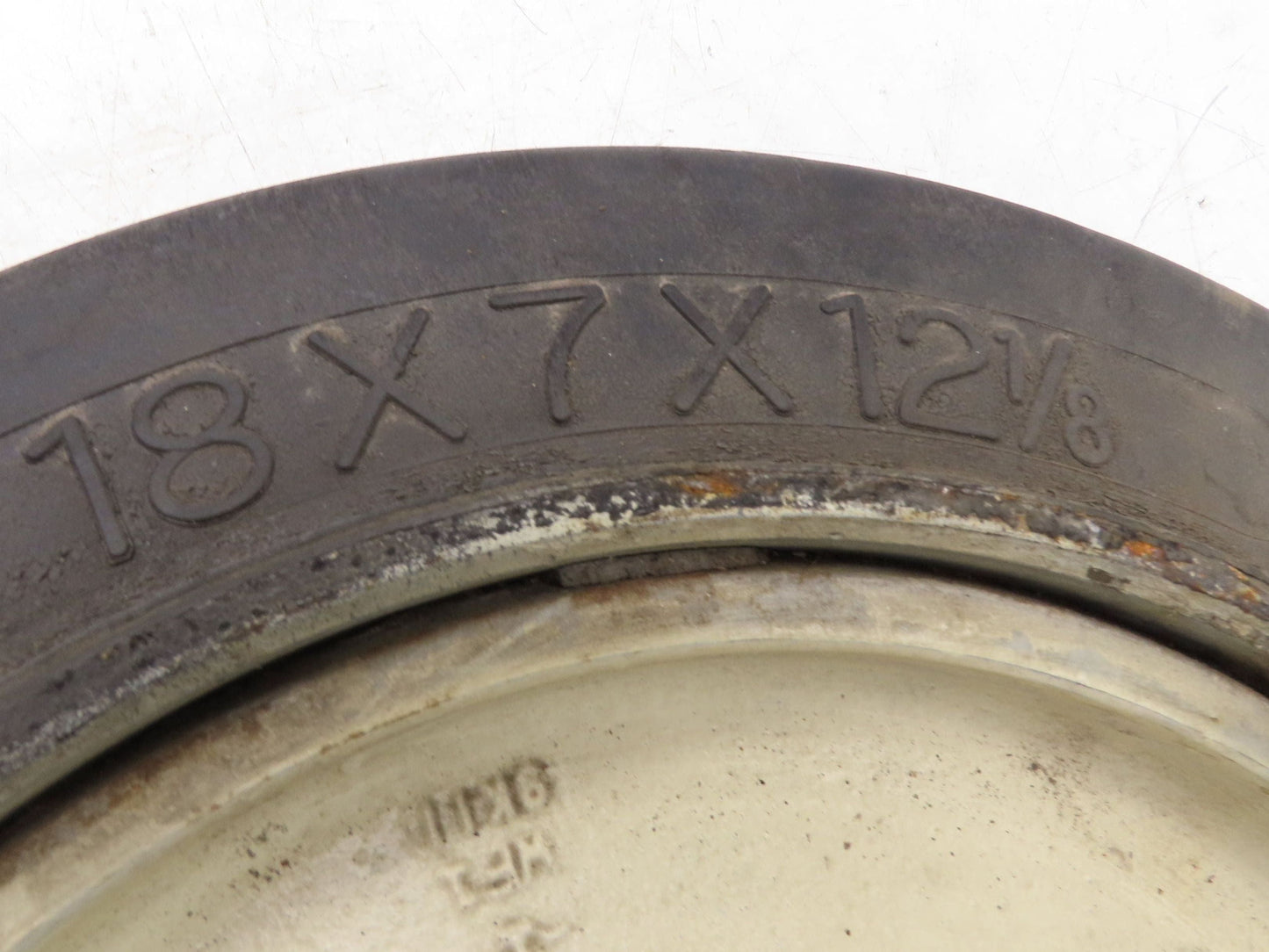 Super Solid 18x7x12-1/8 Forklift Tire Smooth Solid Press-on Black 5x138mm Rim