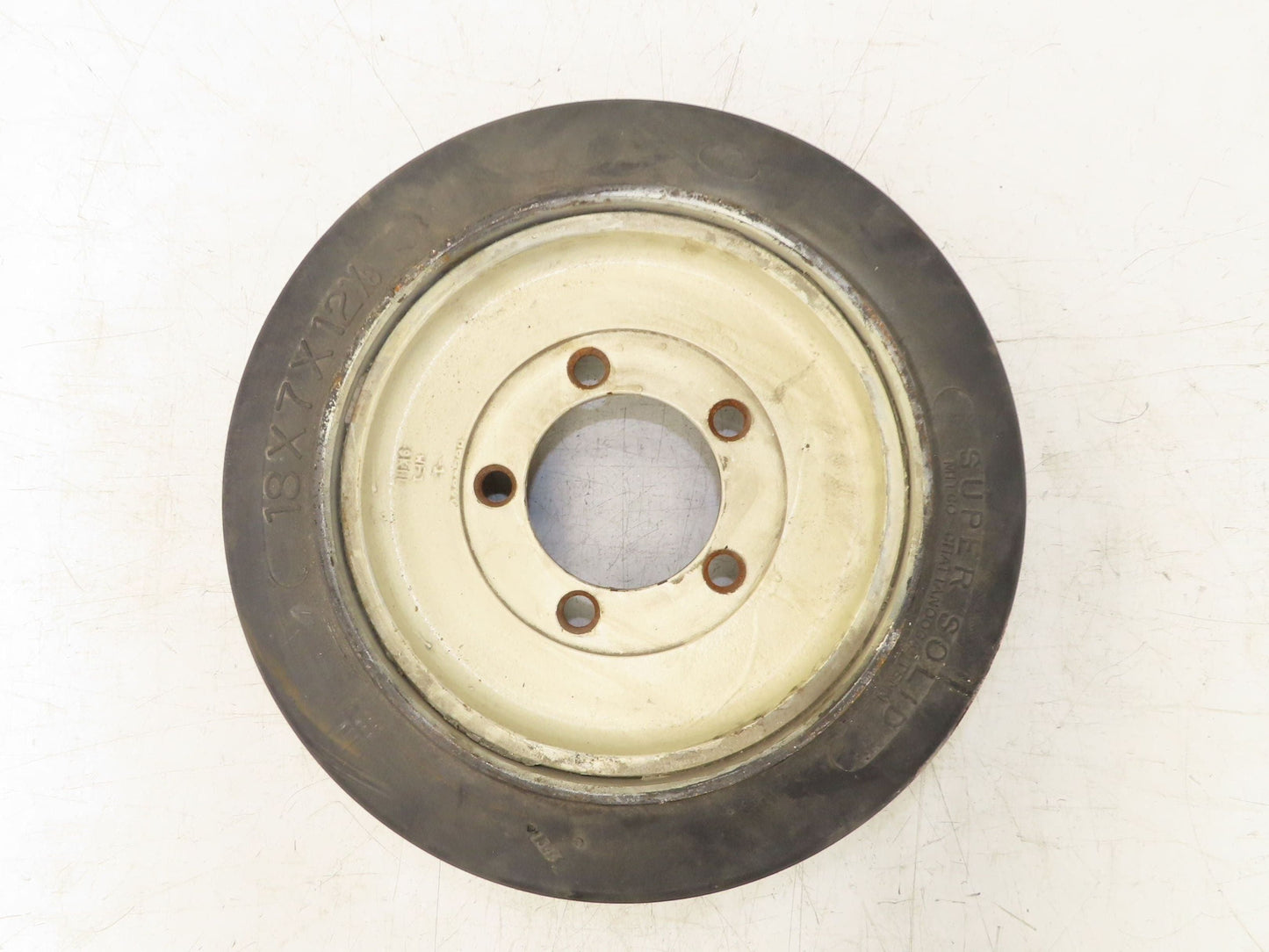 Super Solid 18x7x12-1/8 Forklift Tire Smooth Solid Press-on Black 5x138mm Rim