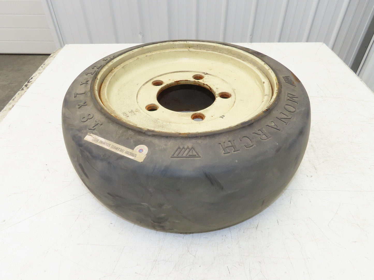 Monarch 18x7x12-1/8 Forklift Tire Smooth Solid Press-on Black 5x138mm Rim