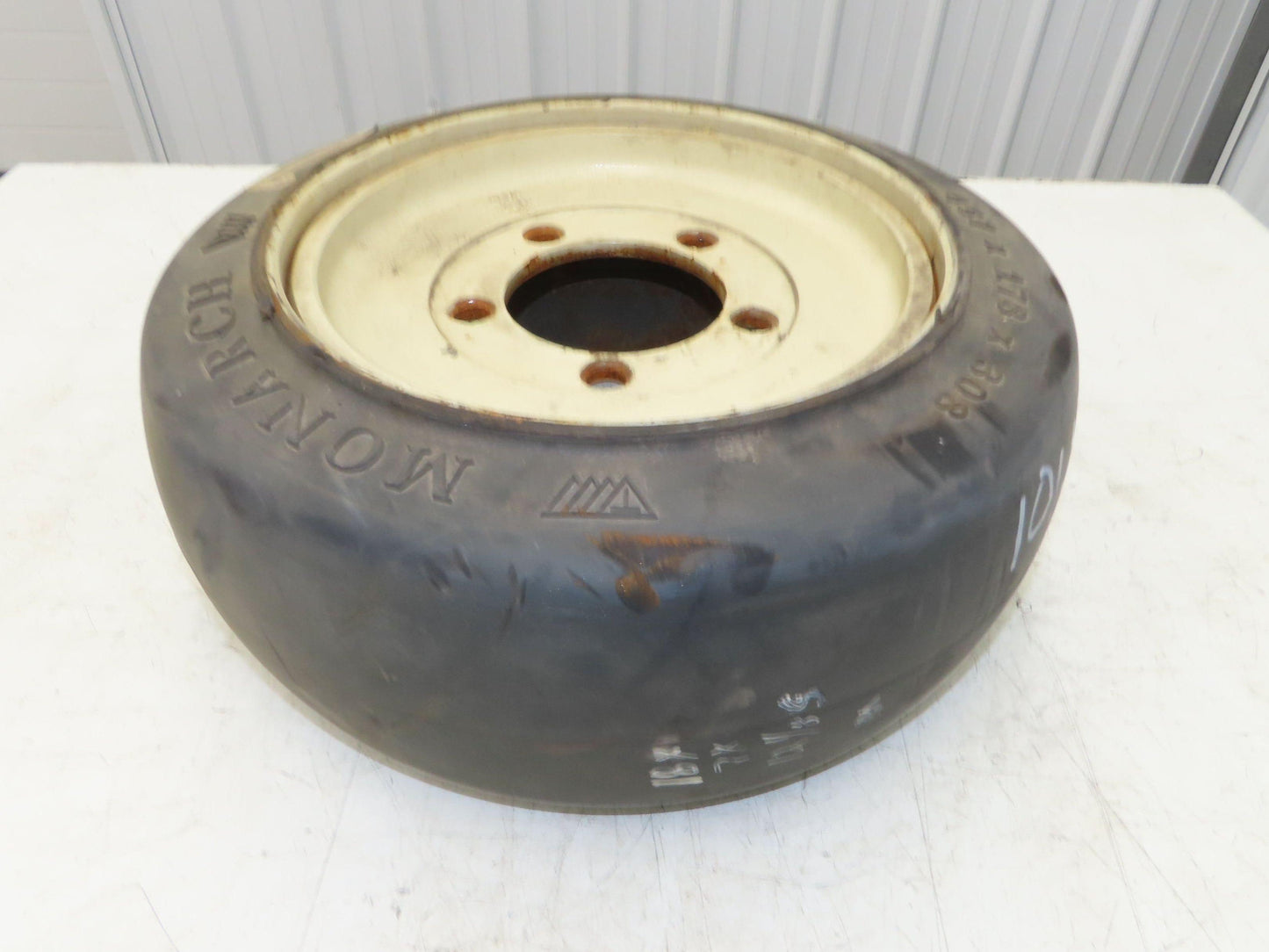 Monarch 18x7x12-1/8 Forklift Tire Smooth Solid Press-on Black 5x138mm Rim