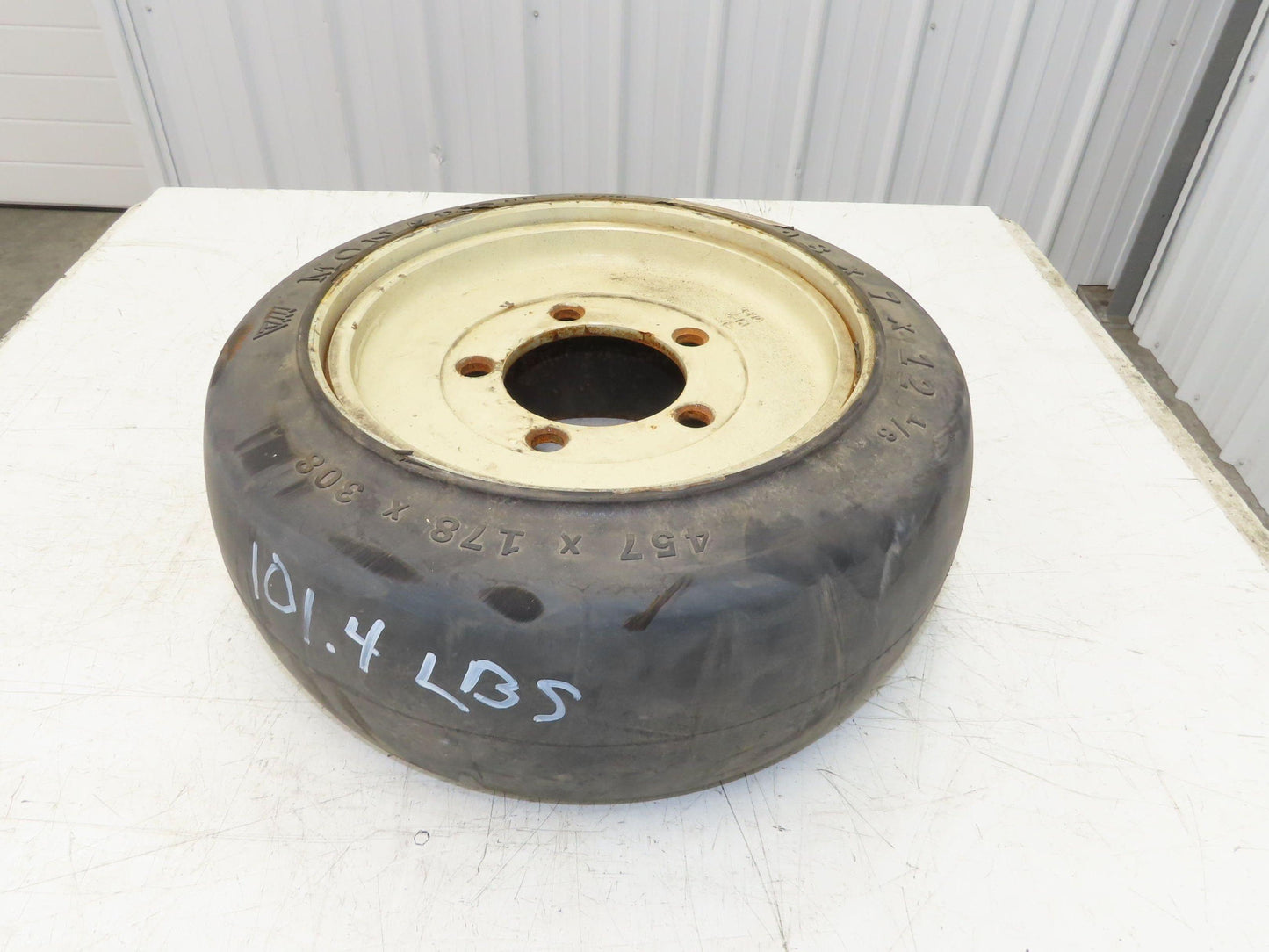 Monarch 18x7x12-1/8 Forklift Tire Smooth Solid Press-on Black 5x138mm Rim