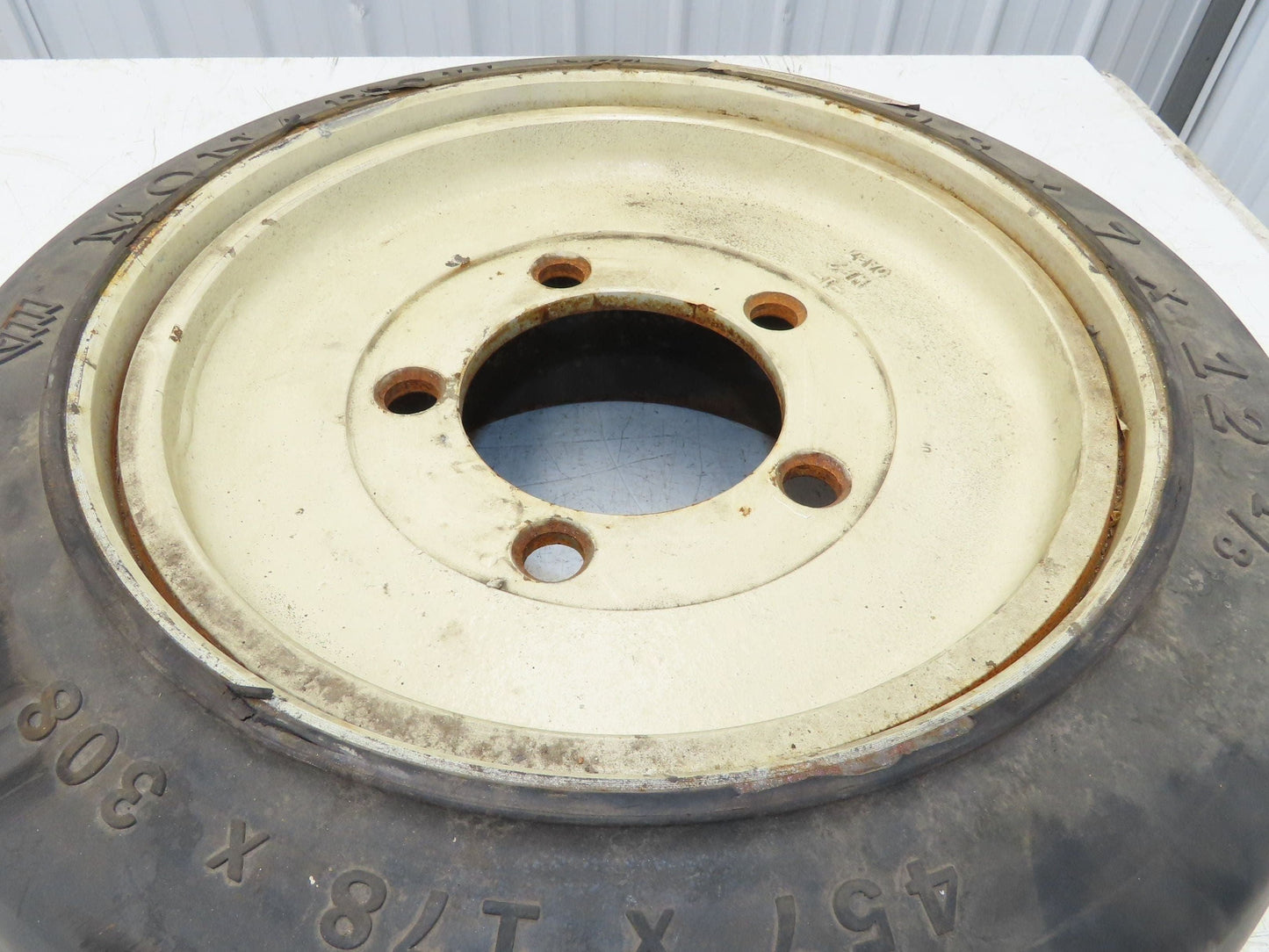 Monarch 18x7x12-1/8 Forklift Tire Smooth Solid Press-on Black 5x138mm Rim