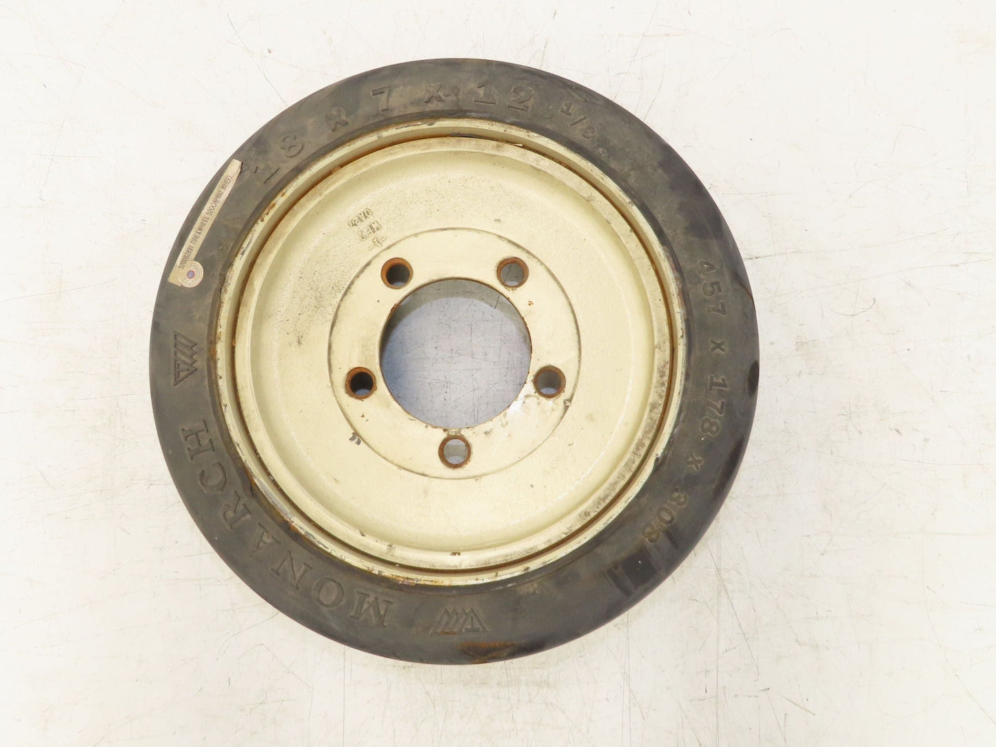 Monarch 18x7x12-1/8 Forklift Tire Smooth Solid Press-on Black 5x138mm Rim