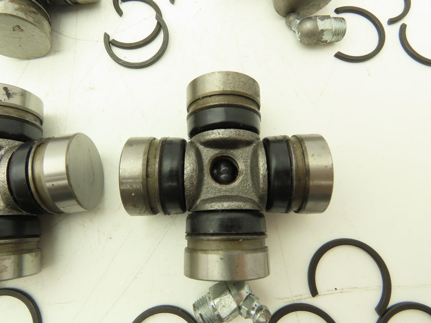 4-Groove U-Joint, 1.063" Cap Diameter, 2.5" OAL, 1.651" Inside Lock-up Lot of 7