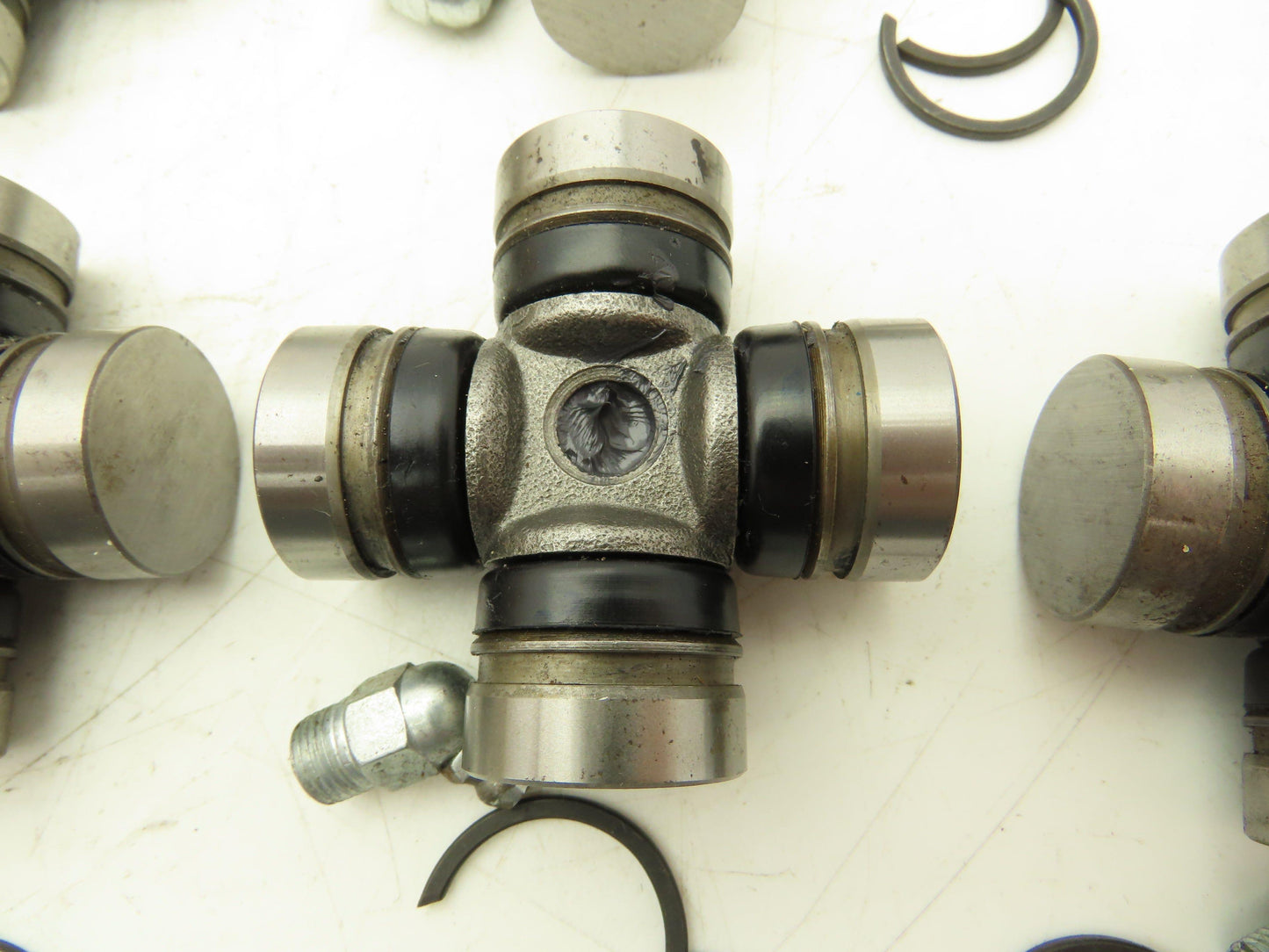 4-Groove U-Joint, 1.063" Cap Diameter, 2.5" OAL, 1.651" Inside Lock-up Lot of 7