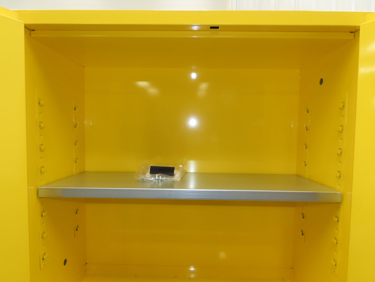 Uline H-1563M-Y Yellow Flammable Safety Cabinet Dual Door 30 Gallon Liquid