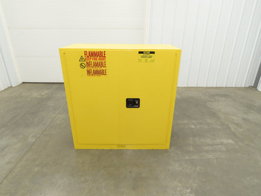 Uline H-1563M-Y Yellow Flammable Safety Cabinet Dual Door 30 Gallon Liquid