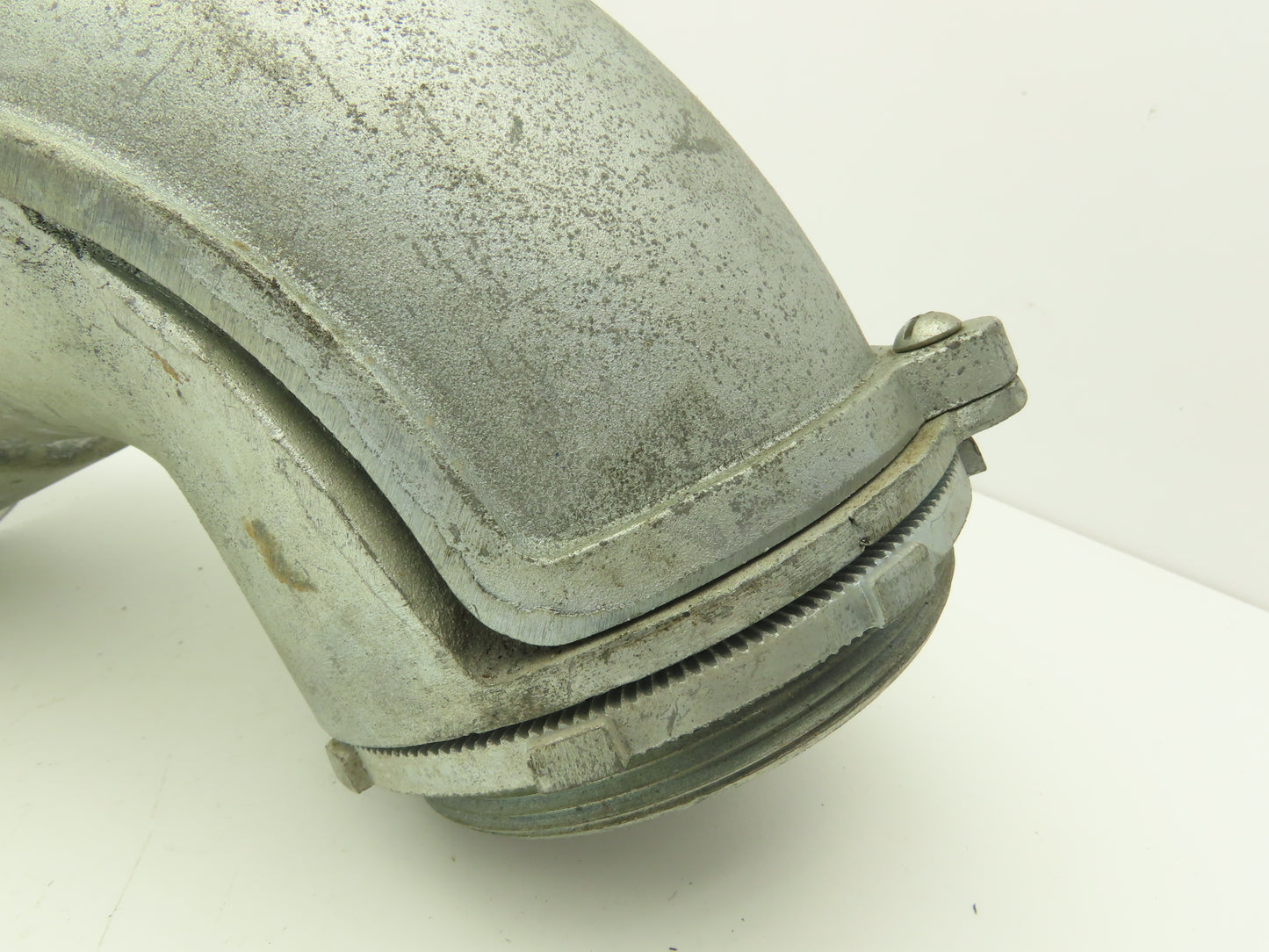 NA Metallic Flex Squeeze Connector 4" 90° Elbow Zinc Die Cast