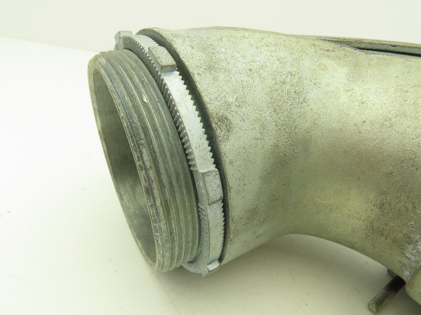 NA Metallic Flex Squeeze Connector 4" 90° Elbow Zinc Die Cast