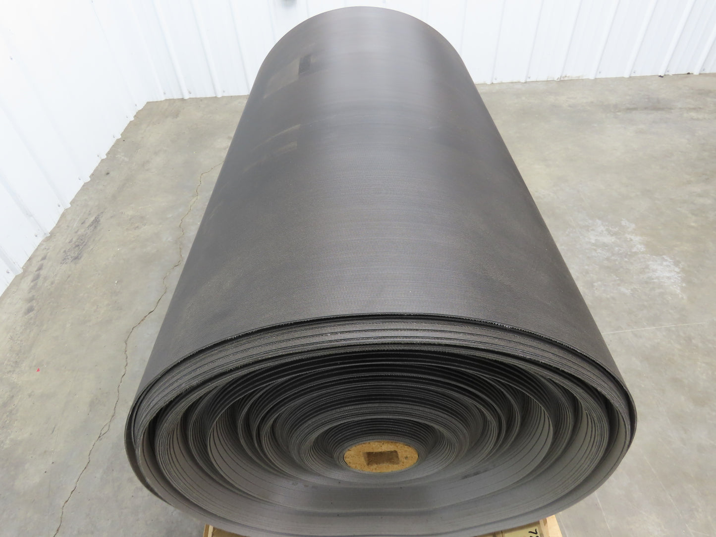 Hytrol 47.5"W x 722' Grooved Rubber Conveyor Belt 2-Ply Black 49"BW