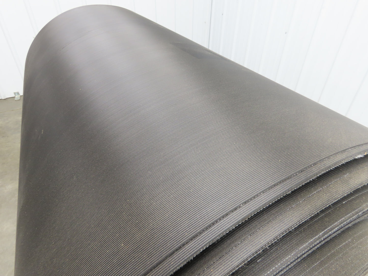 Hytrol 47.5"W x 722' Grooved Rubber Conveyor Belt 2-Ply Black 49"BW