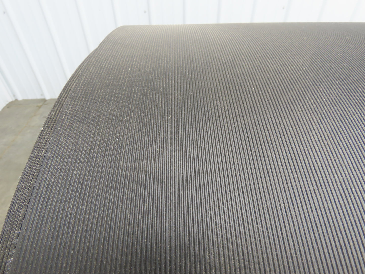 Hytrol 47.5"W x 722' Grooved Rubber Conveyor Belt 2-Ply Black 49"BW