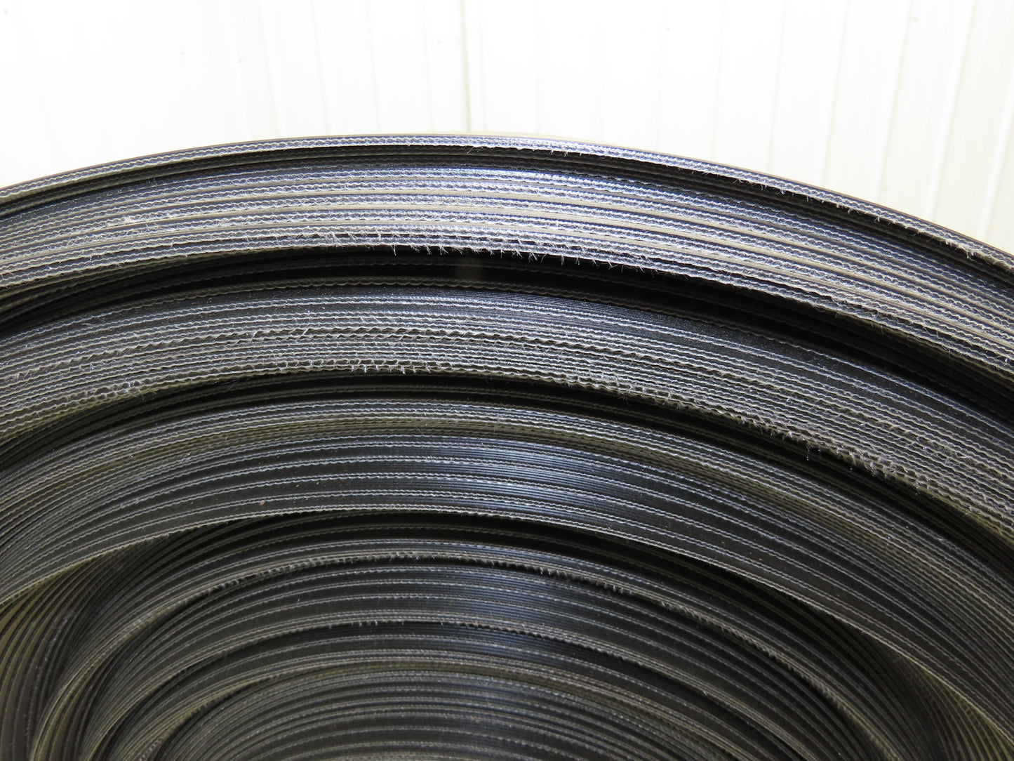 Hytrol 47.5"W x 722' Grooved Rubber Conveyor Belt 2-Ply Black 49"BW