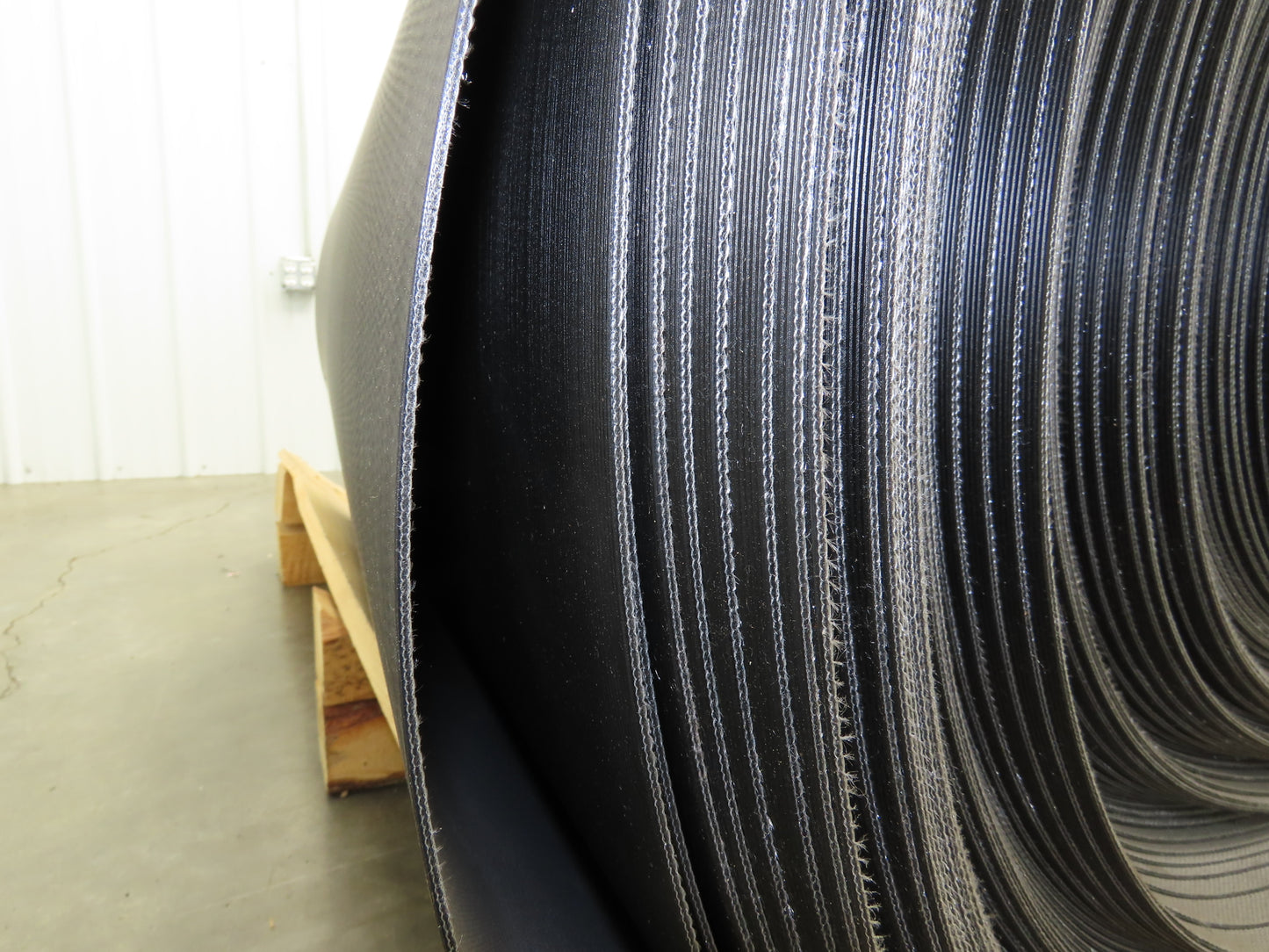 Hytrol 47.5"W x 722' Grooved Rubber Conveyor Belt 2-Ply Black 49"BW