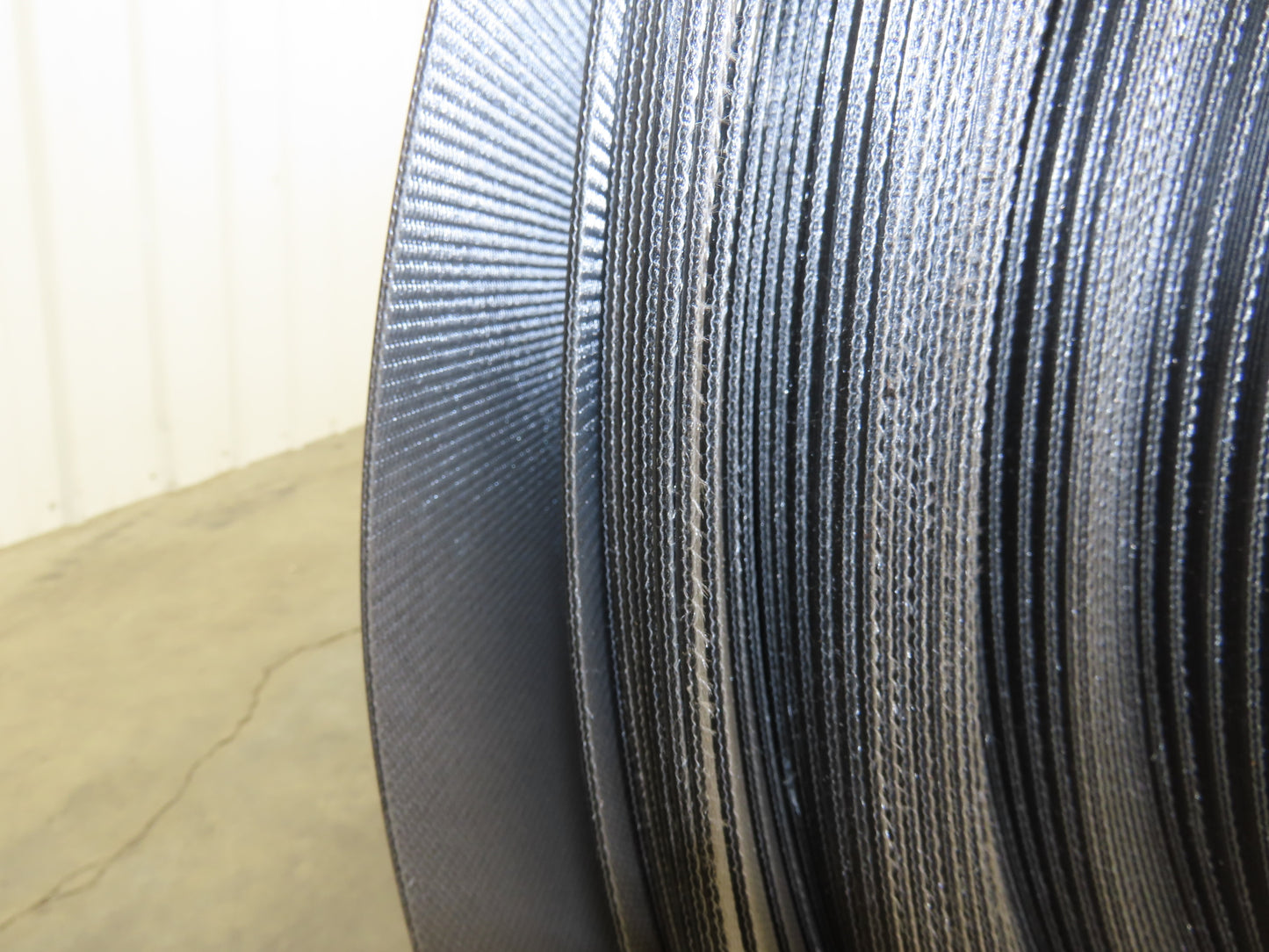 Hytrol 47.5"W x 722' Grooved Rubber Conveyor Belt 2-Ply Black 49"BW