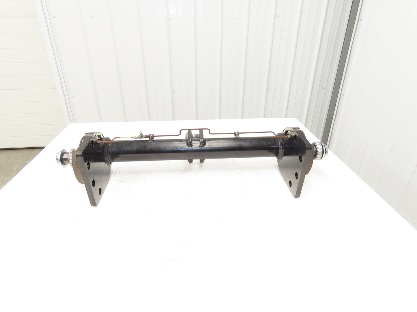 Landoll Front Axle Hub & Brake Assembly Removed From LSC30 Stand On Forklift