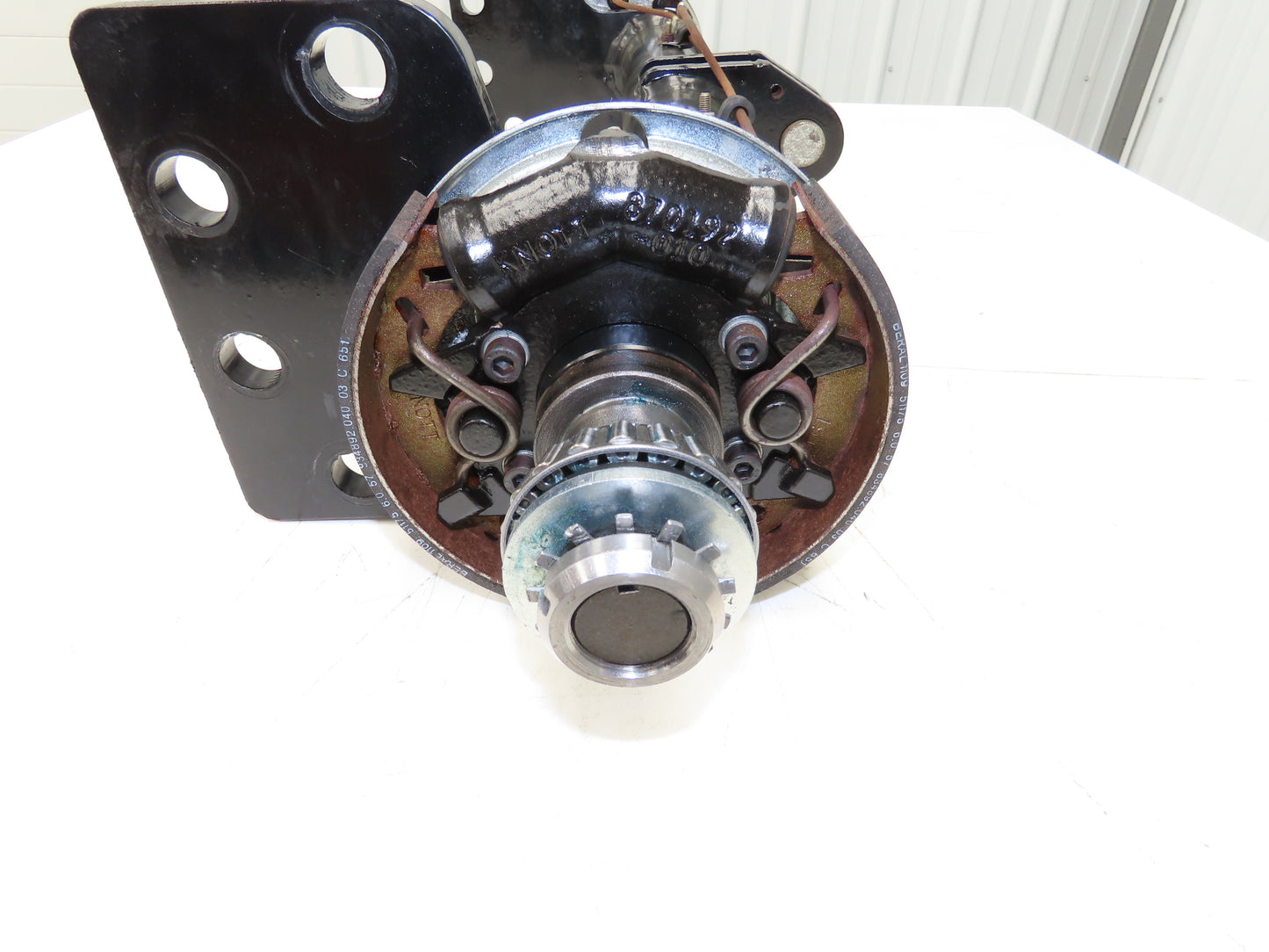 Landoll Front Axle Hub & Brake Assembly Removed From LSC30 Stand On Forklift