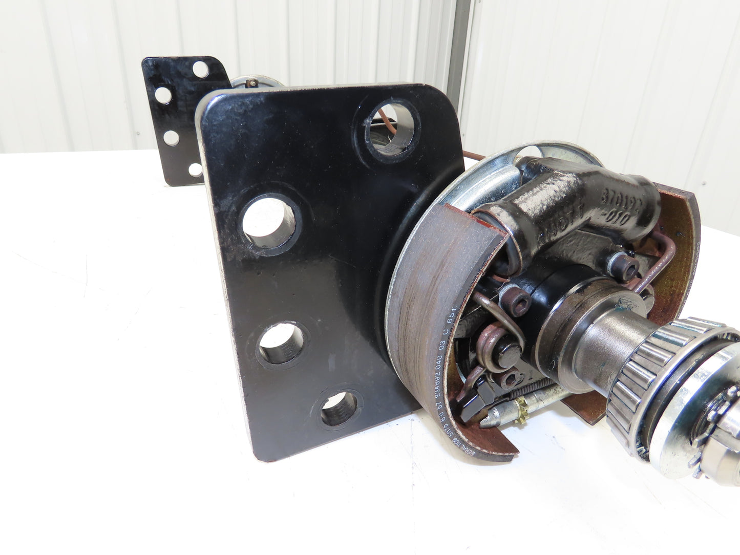 Landoll Front Axle Hub & Brake Assembly Removed From LSC30 Stand On Forklift