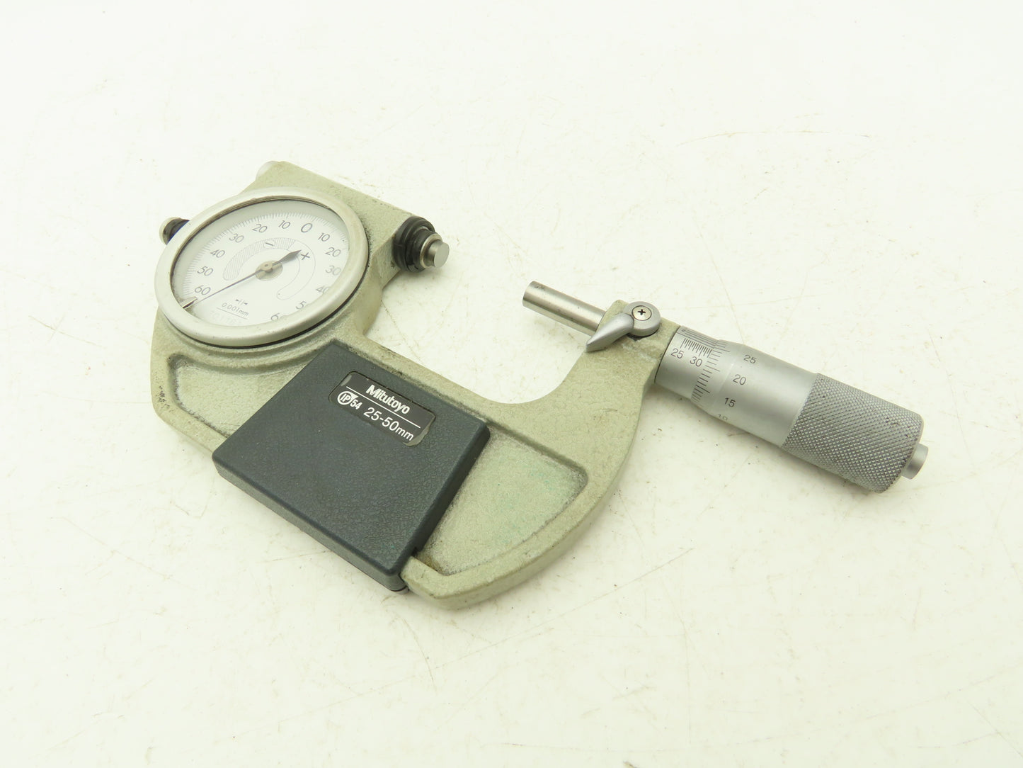 Mitutoyo 510-122 Indicating Micrometer 25-50mm Graduations .001mm Range +/- .060