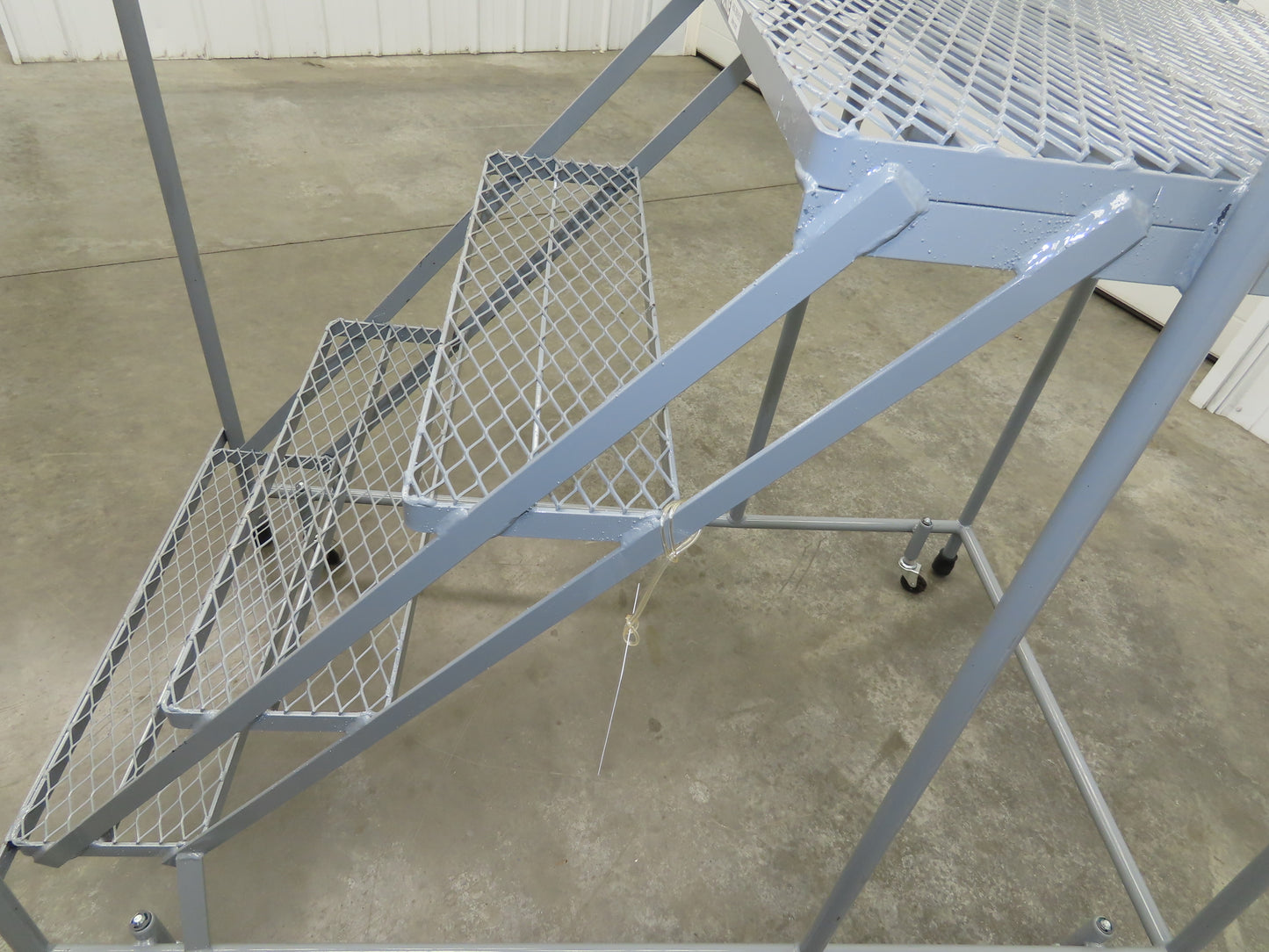 Uline H-1082-20 Rolling Ladder 4 Step 20" Work Platform 40" Top Step 450lbs Cap