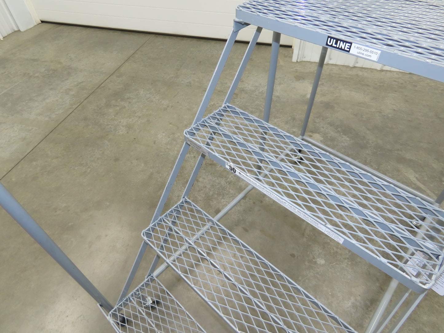 Uline H-1082-20 Rolling Ladder 4 Step 20" Work Platform 40" Top Step 450lbs Cap