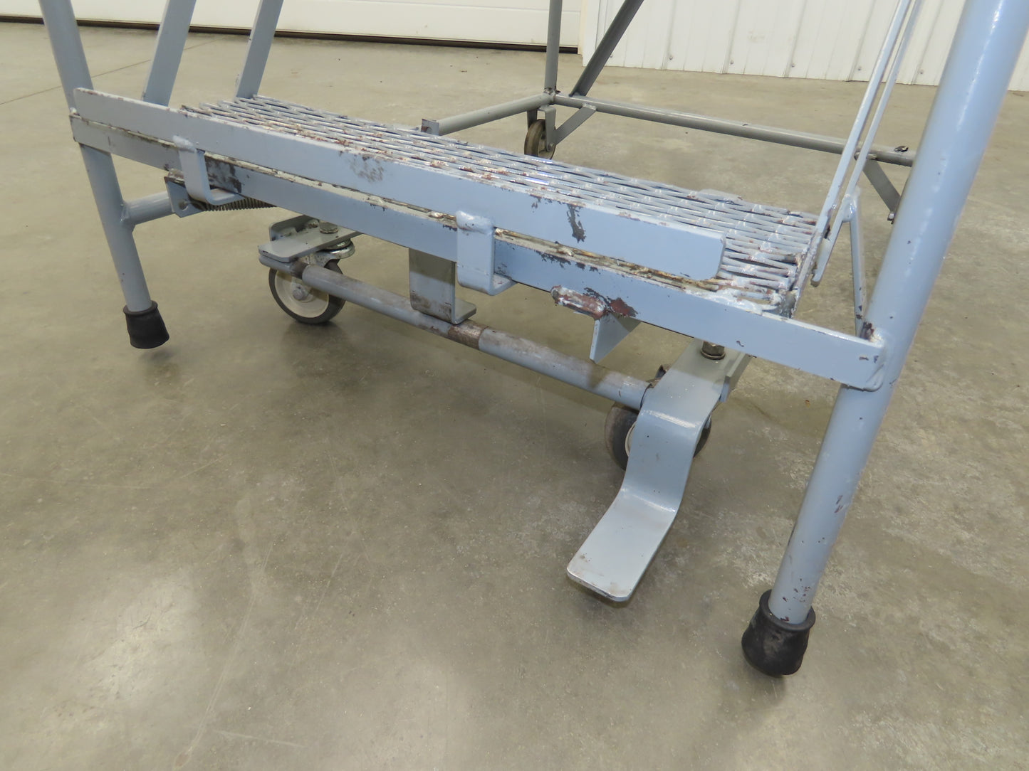 Uline H-84-110 Rolling Ladder 5 Step 10" Work Platform 50" Top Step 450lbs