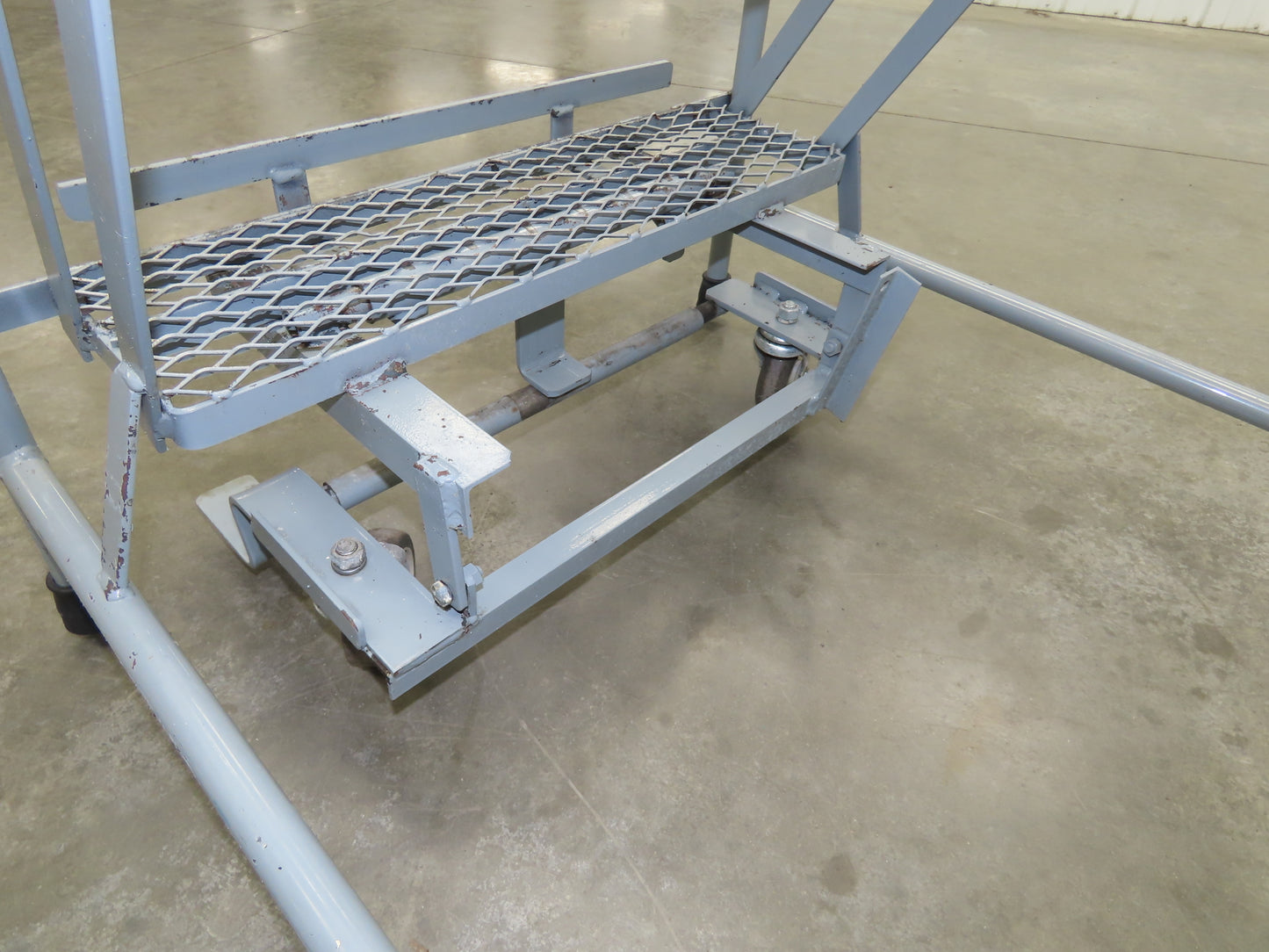 Uline H-84-110 Rolling Ladder 5 Step 10" Work Platform 50" Top Step 450lbs