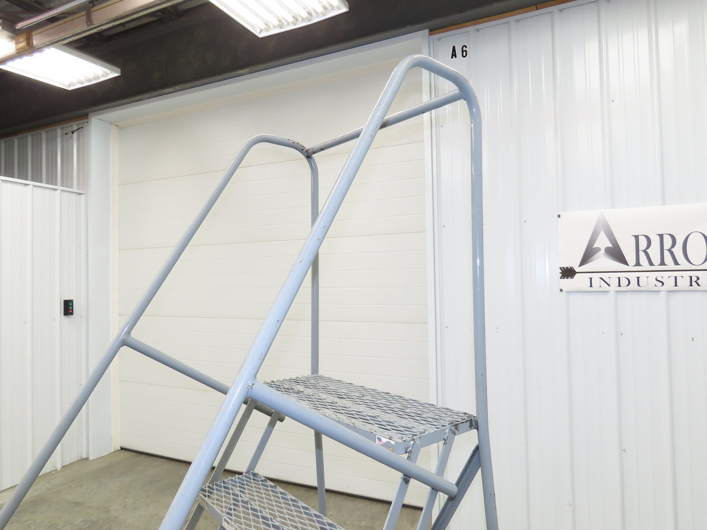 Uline H-84-110 Rolling Ladder 5 Step 10" Work Platform 50" Top Step 450lbs