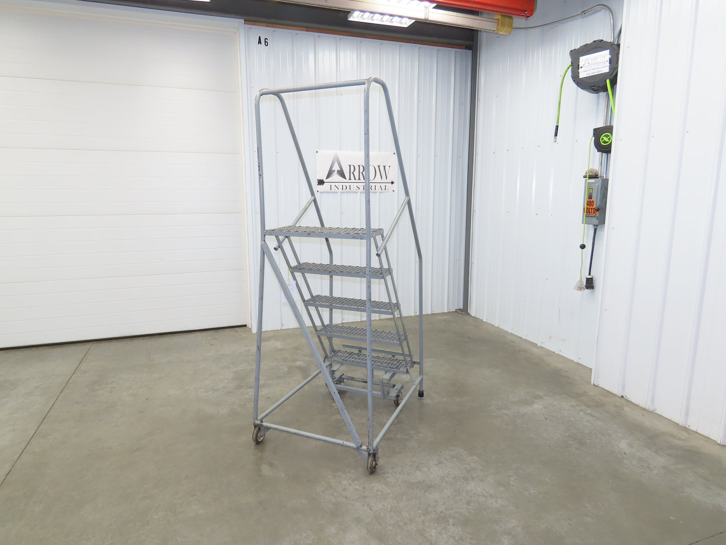 Uline H-84-110 Rolling Ladder 5 Step 10" Work Platform 50" Top Step 450lbs