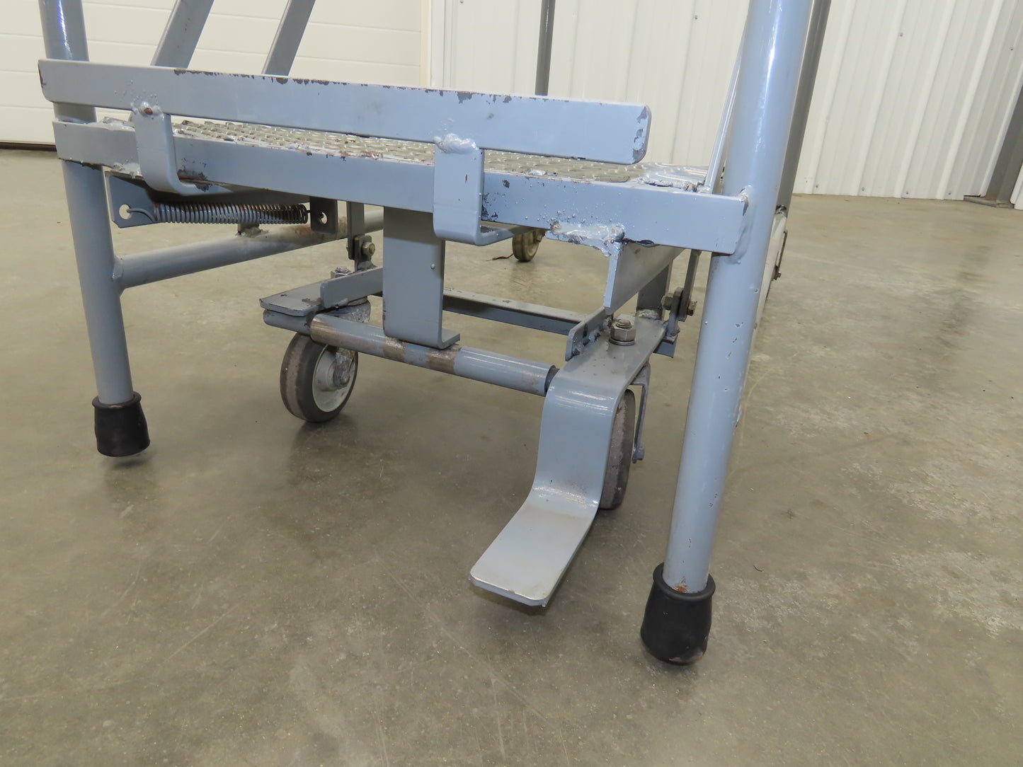 Uline H-5073A-10 Rolling Ladder Narrow Aisle 5 Step 10" Platform 50" Top Step