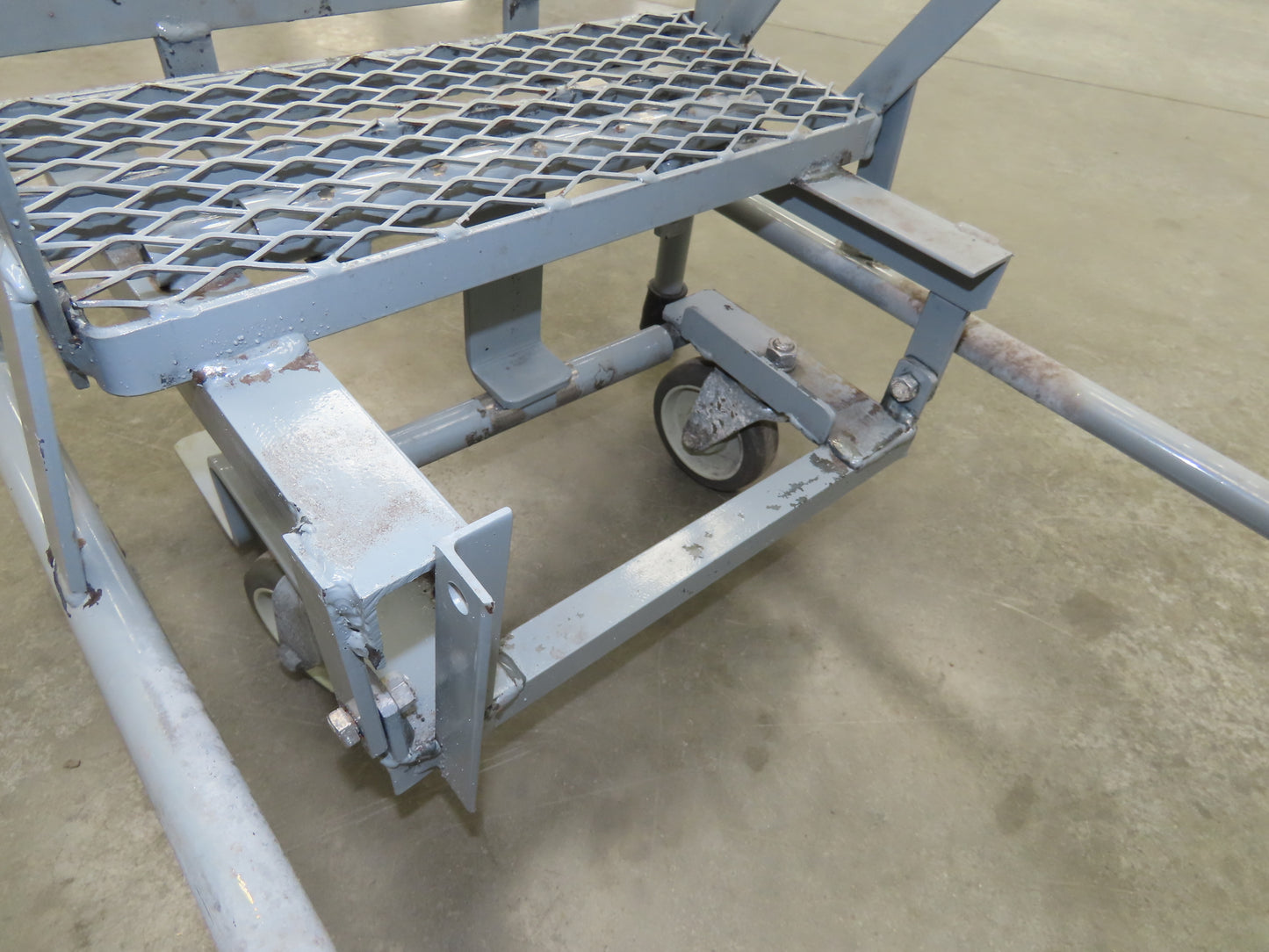 Uline H-5073A-10 Rolling Ladder Narrow Aisle 5 Step 10" Platform 50" Top Step