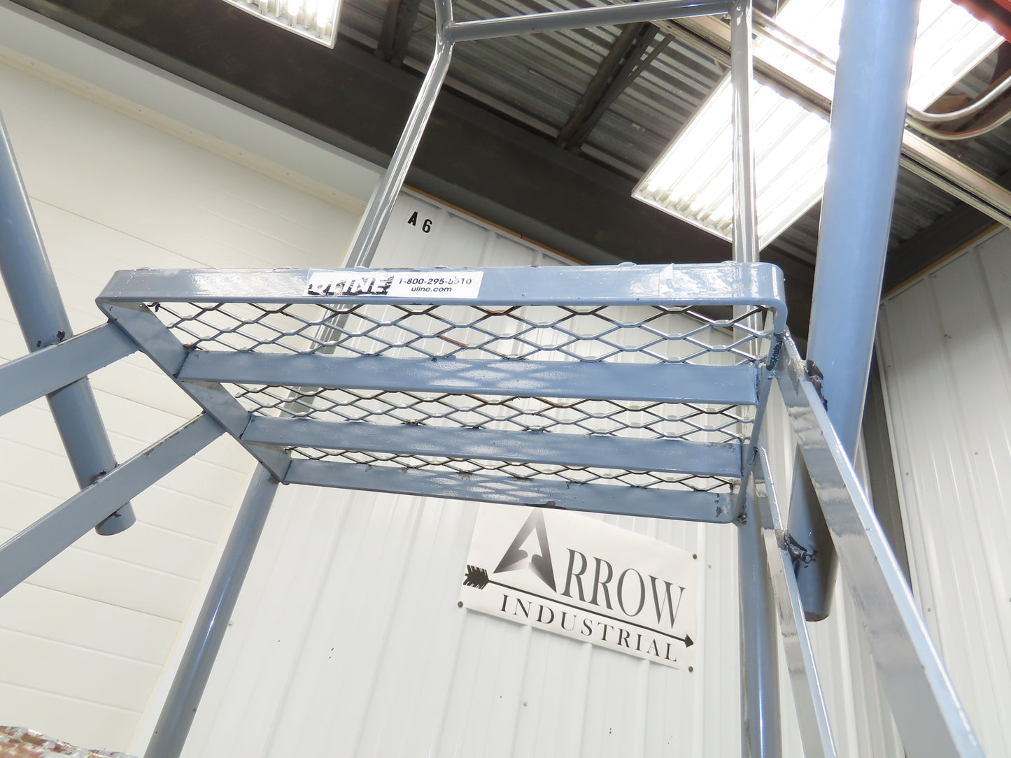 Uline H-5073A-10 Rolling Ladder Narrow Aisle 5 Step 10" Platform 50" Top Step