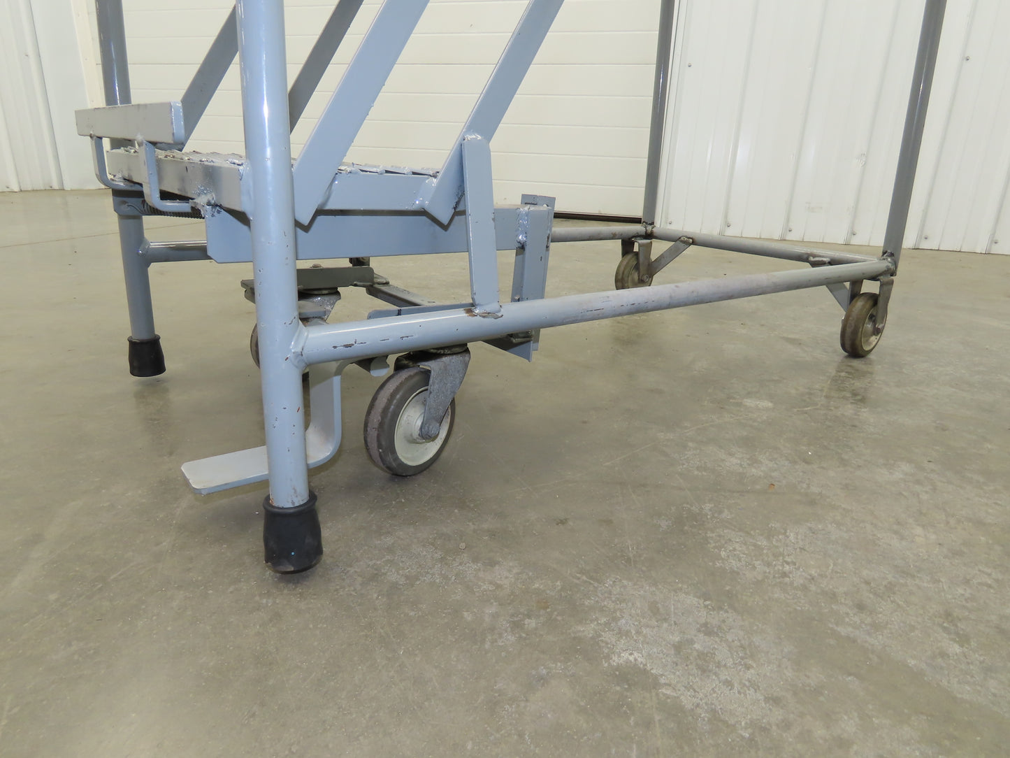 Uline H-5073A-10 Rolling Ladder Narrow Aisle 5 Step 10" Platform 50" Top Step