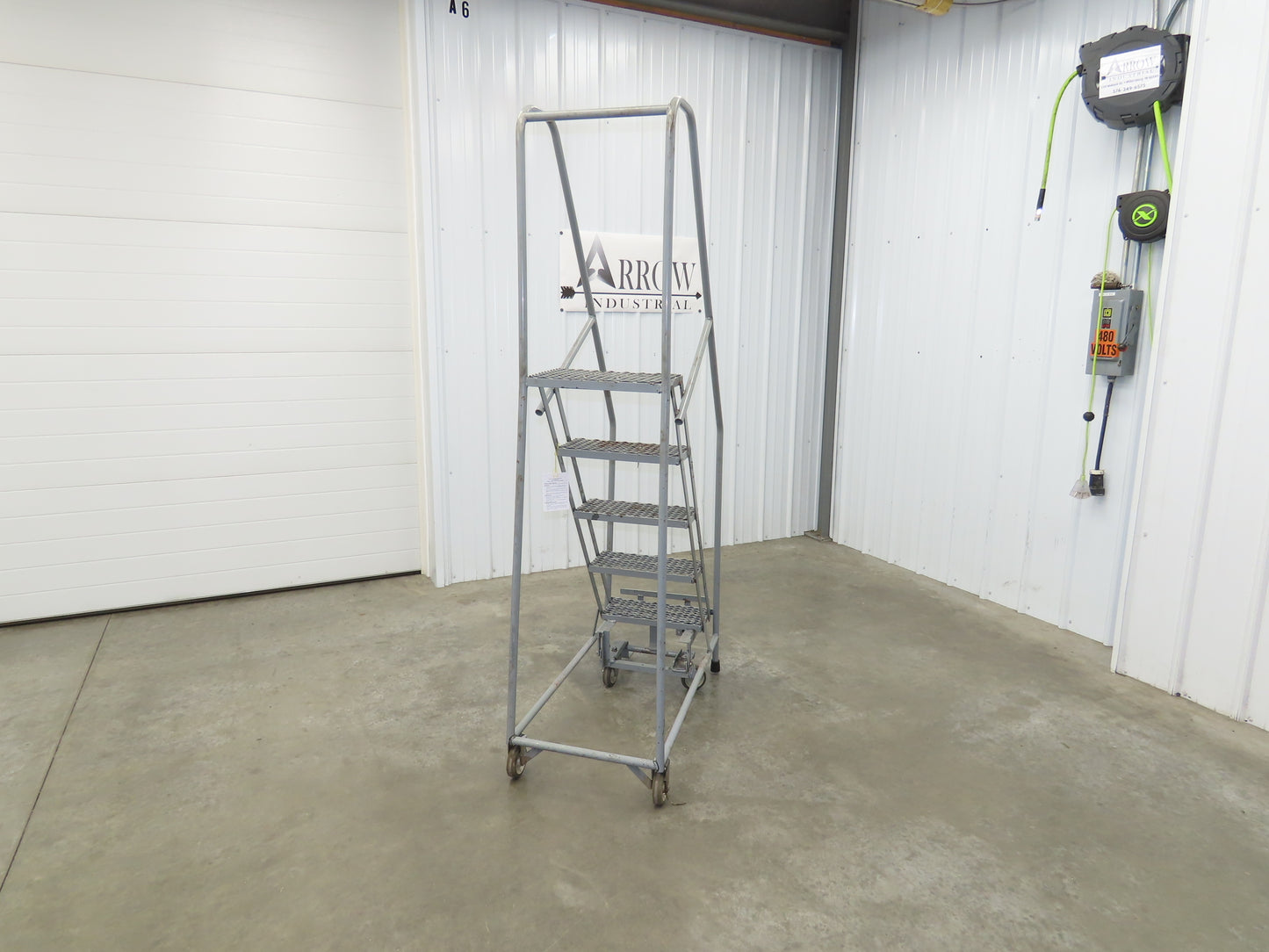 Uline H-5073A-10 Rolling Ladder Narrow Aisle 5 Step 10" Platform 50" Top Step