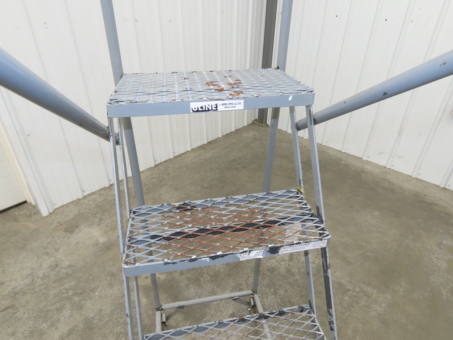 Uline H-5073A-10 Rolling Ladder Narrow Aisle 5 Step 10" Platform 50" Top Step